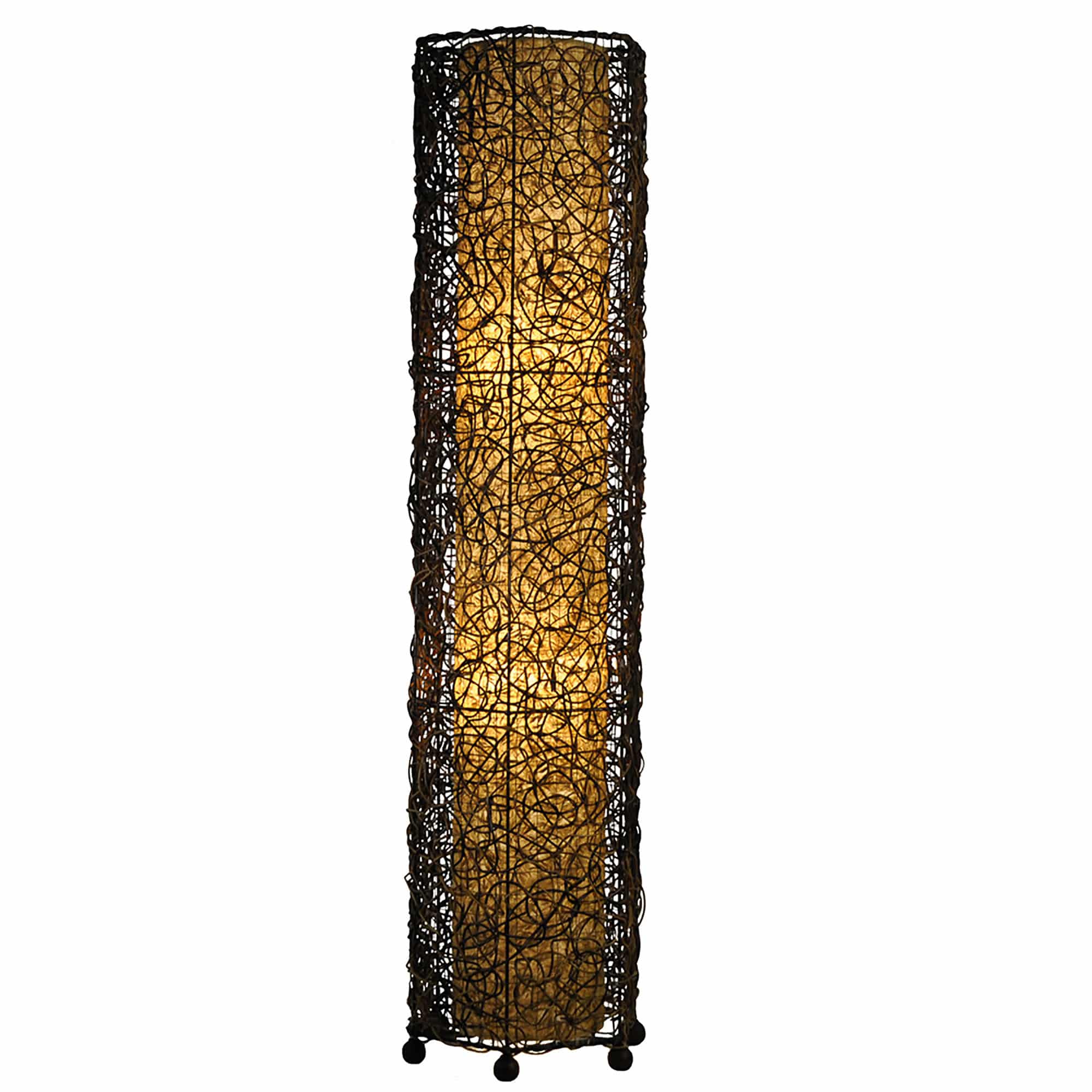 In a coastal inspired living room, crafted by the artisans of Eangee Home Design, the Nito Large Floor Lamp in natural stands gracefully, featuring recycled paper shade, eco friendly, recycled materials, adding warmth and character to the space.