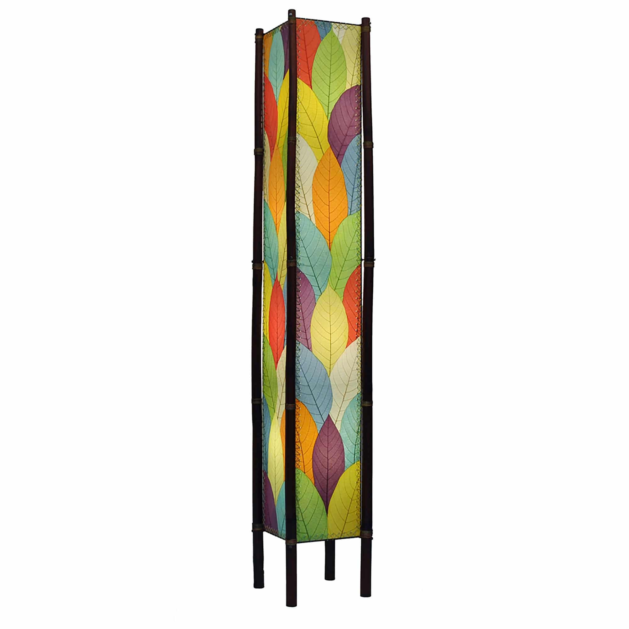 Crafted by the artisans of Eangee Home Design, the Fortune Giant Floor Lamp in multi color against a clean backdrop, featuring fossilized cocoa leaf shade, abaca rope accents, rattan leg supports, wrought iron frame, eco friendly.