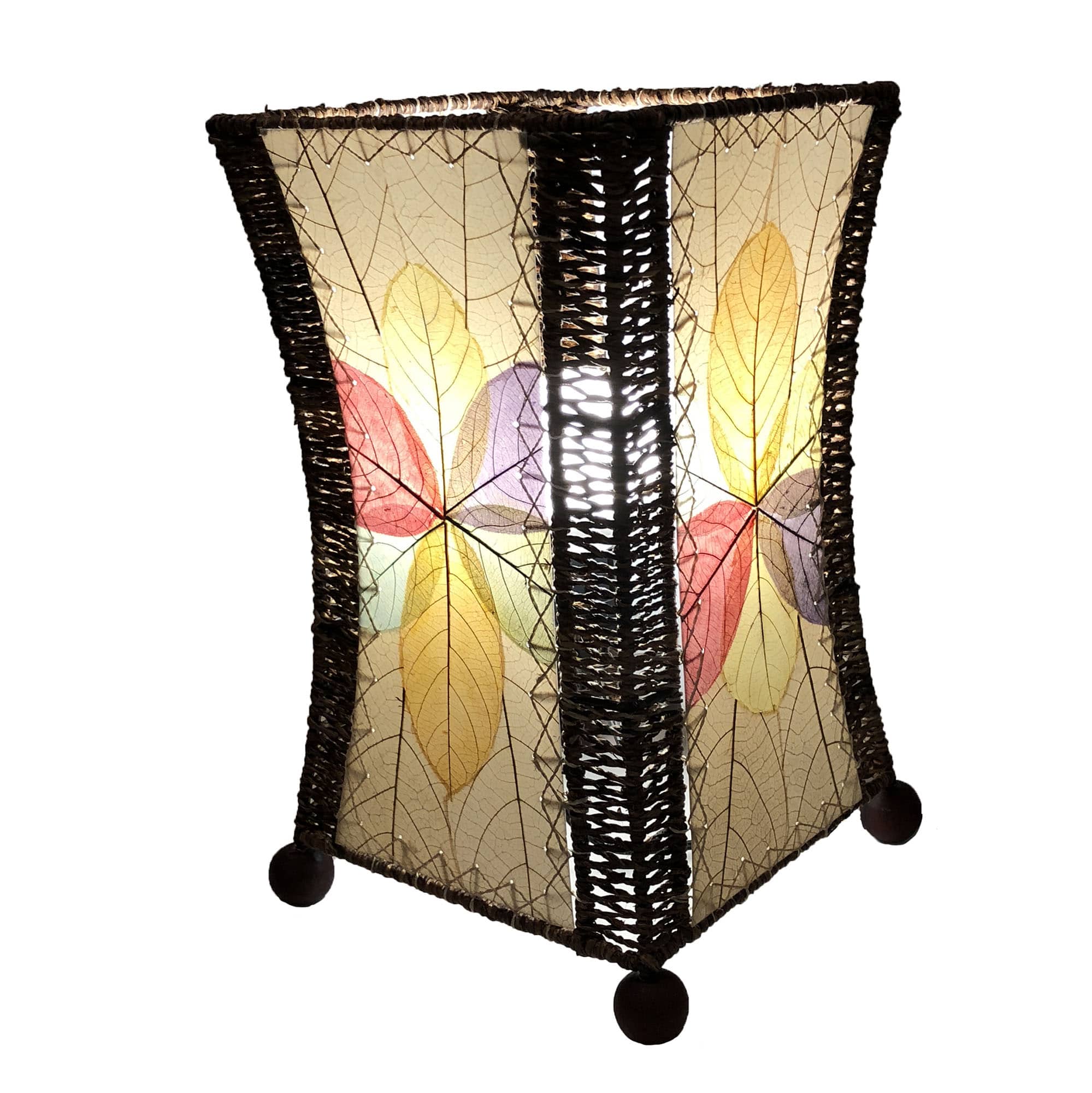 Crafted by the artisans of Eangee Home Design, the Hourglass Table Lamp in multi color against a clean backdrop, featuring jackfruit leaf panels, abaca rope accents, wrought iron frame, eco friendly.