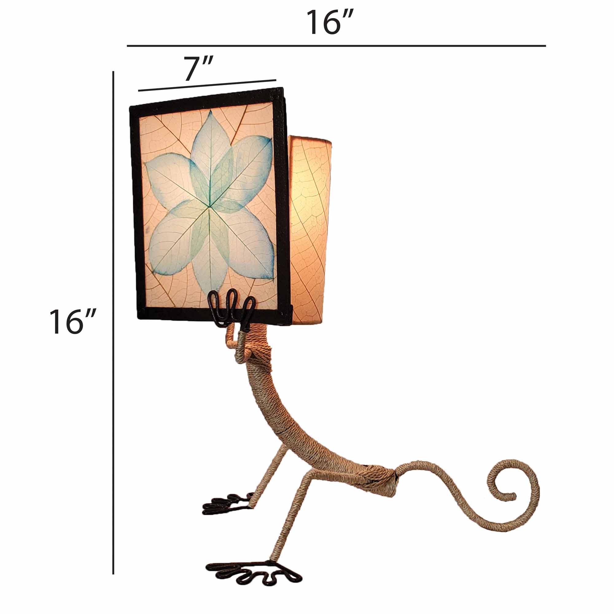 Crafted by the artisans of Eangee Home Design, the Enlightened Gecko Table Lamp in sea blue against a clean backdrop, featuring fossilized cocoa leaf shade, guyabano leaf shade, abaca rope accents, wrought iron frame, handcrafted.