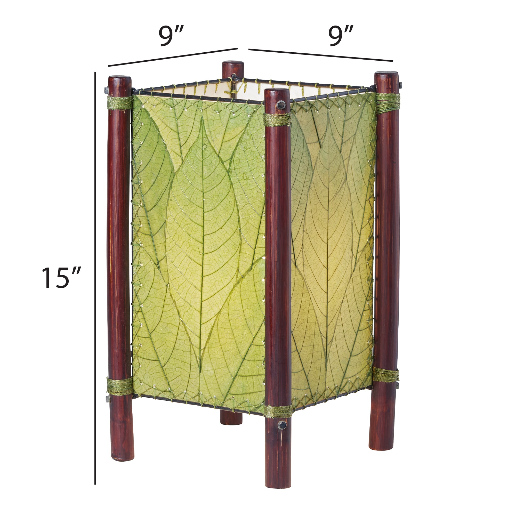 Crafted by the artisans of Eangee Home Design, the Fortune Table Lamp in green against a clean backdrop, featuring fossilized cocoa leaf shade, abaca rope accents, rattan leg supports.