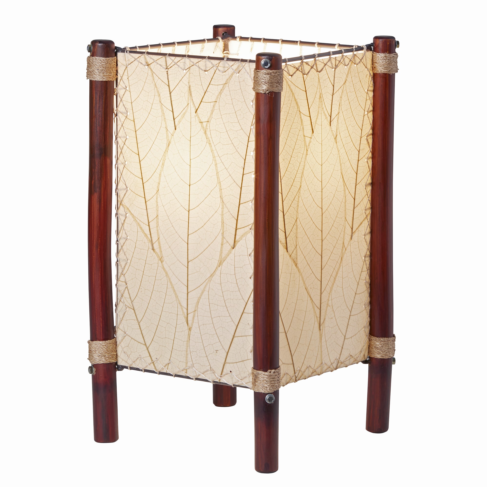 Crafted by the artisans of Eangee Home Design, the Fortune Table Lamp in natural against a clean backdrop, featuring fossilized cocoa leaf shade, abaca rope accents, rattan leg supports.
