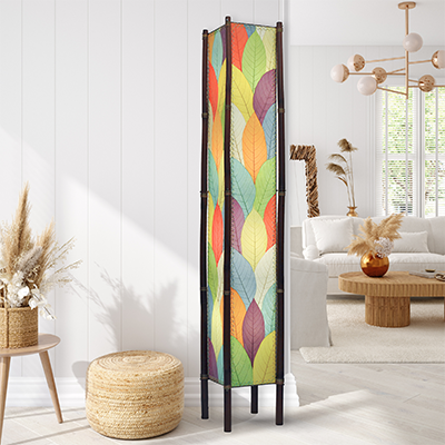 In a quiet bedside corner, crafted by the artisans of Eangee Home Design, the Fortune Giant Floor Lamp in multi color stands gracefully, featuring fossilized cocoa leaf shade, abaca rope accents, rattan leg supports, wrought iron frame, eco friendly, adding warmth and character to the space.