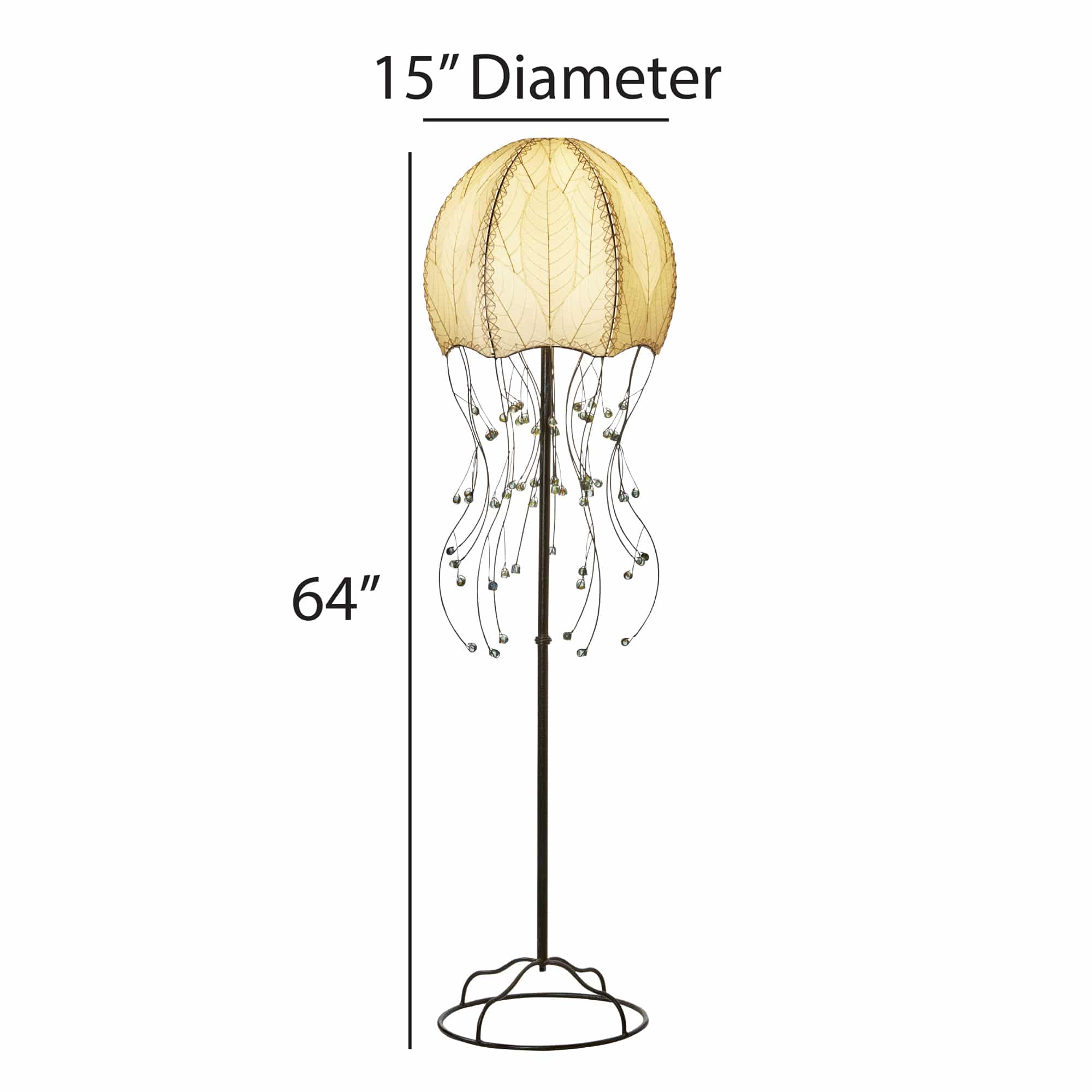 In a reading nook with a linen armchair, the Jellyfish Large Floor crafted by the artisans of Eangee Home Design Lamp in natural finish by Eangee Home Design stands tall, its fossilized cocoa leaf panels, powder coated wrought iron frame, wrought iron frame, and hand placed natural leaves casting a warm glow that there's something hypnotic about it this lamp moves you before it ever moves.