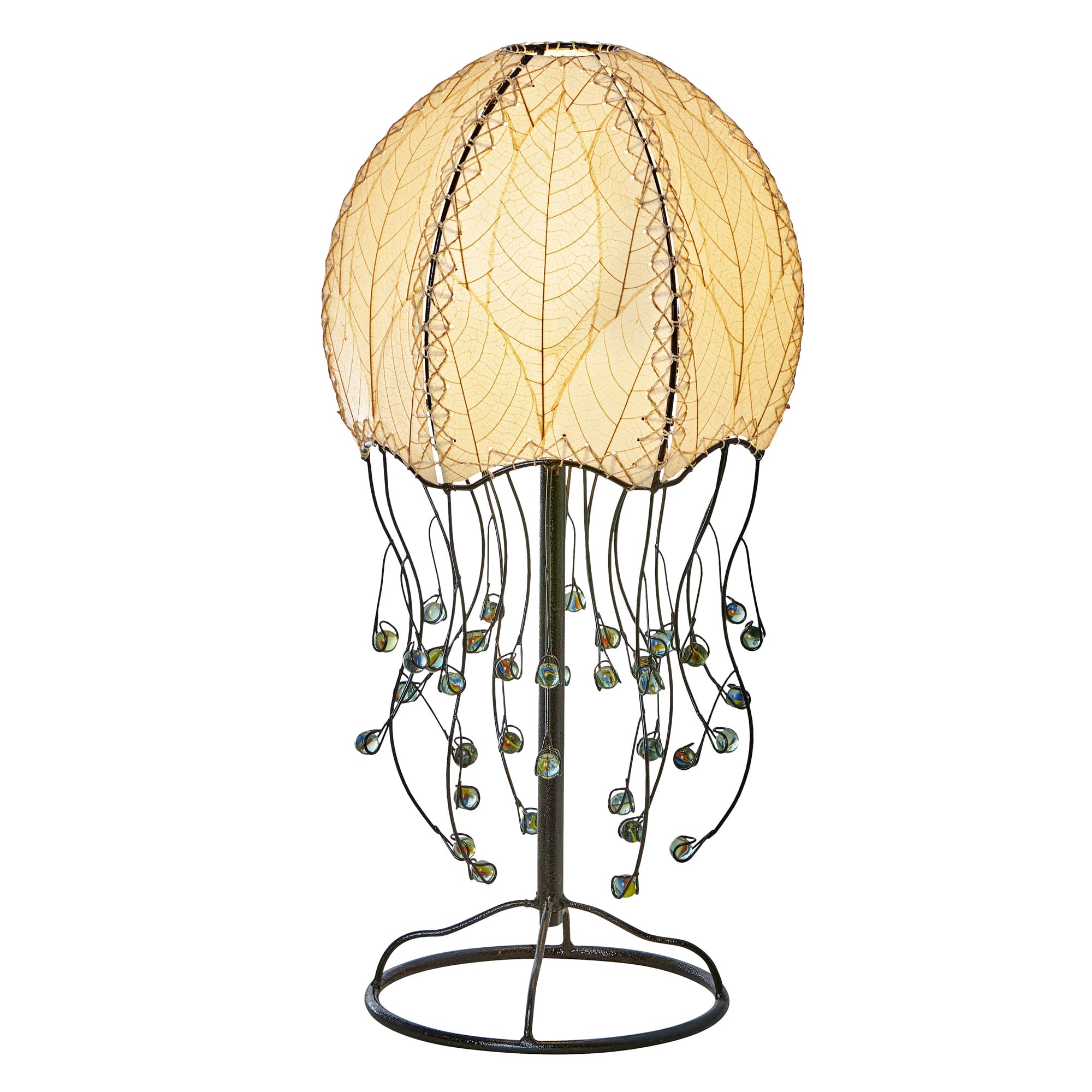 Crafted by the artisans of Eangee Home Design, the Jellyfish Table Lamp in natural against a clean backdrop, featuring fossilized cocoa leaf shade, abaca rope accents, wrought iron frame, handcrafted.
