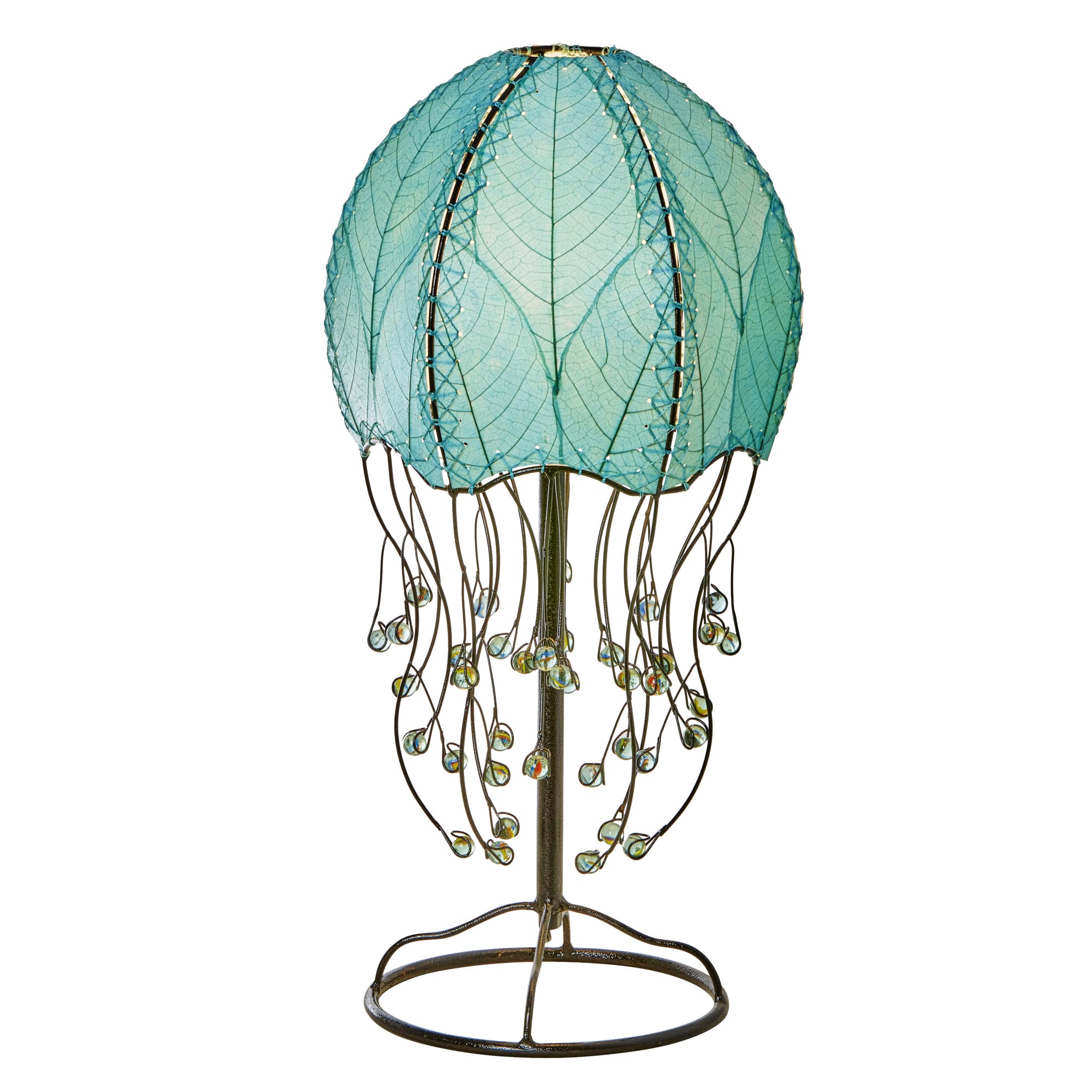Crafted by the artisans of Eangee Home Design, the Jellyfish Table Lamp in sea blue against a clean backdrop, featuring fossilized cocoa leaf shade, abaca rope accents, wrought iron frame, handcrafted.