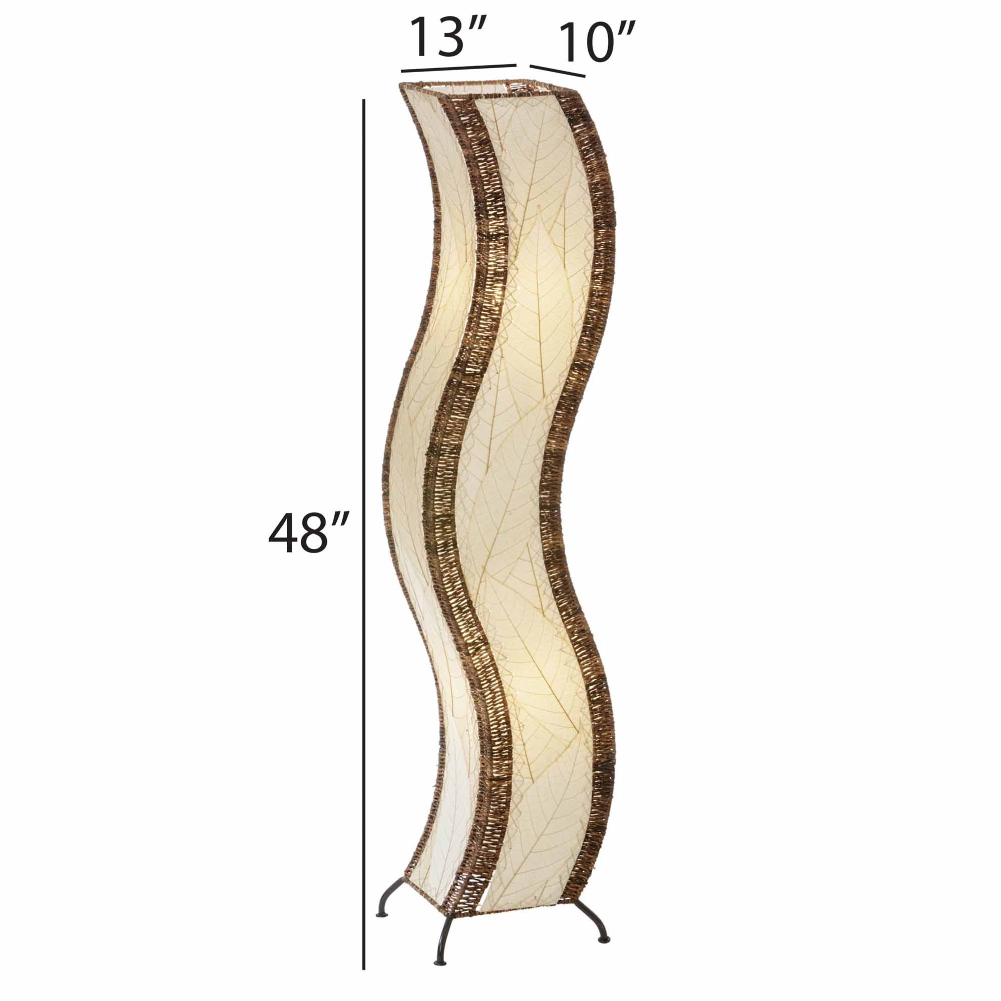 The Wave Large Floor Lamp Natural by Eangee Home Design , featuring a cream shade and dark brown trim, stands on tiled flooring next to a potted plant in a minimalist room with light walls and floating shelves.