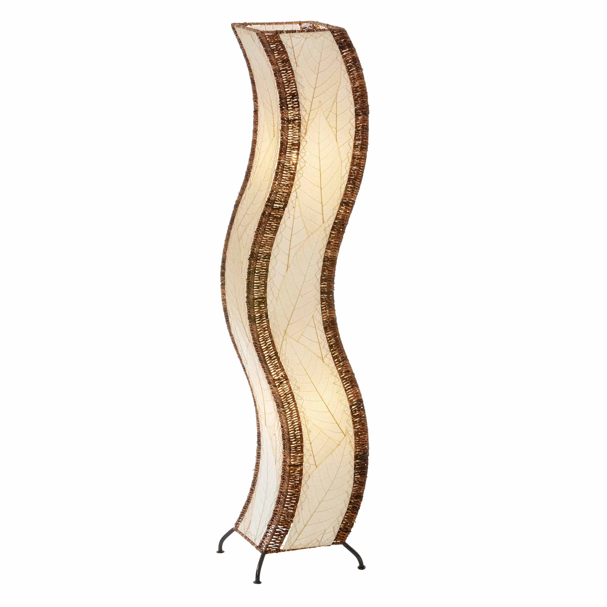 In a entryway beside a console table, the Wave Large Floor crafted by the artisans of Eangee Home Design Lamp in natural finish by Eangee Home Design stands beside a woven jute rug, its fossilized cocoa leaf panels, abaca twine accents, and hand placed natural leaves casting a warm glow that there's something soothing about a shape that doesn't sit still.