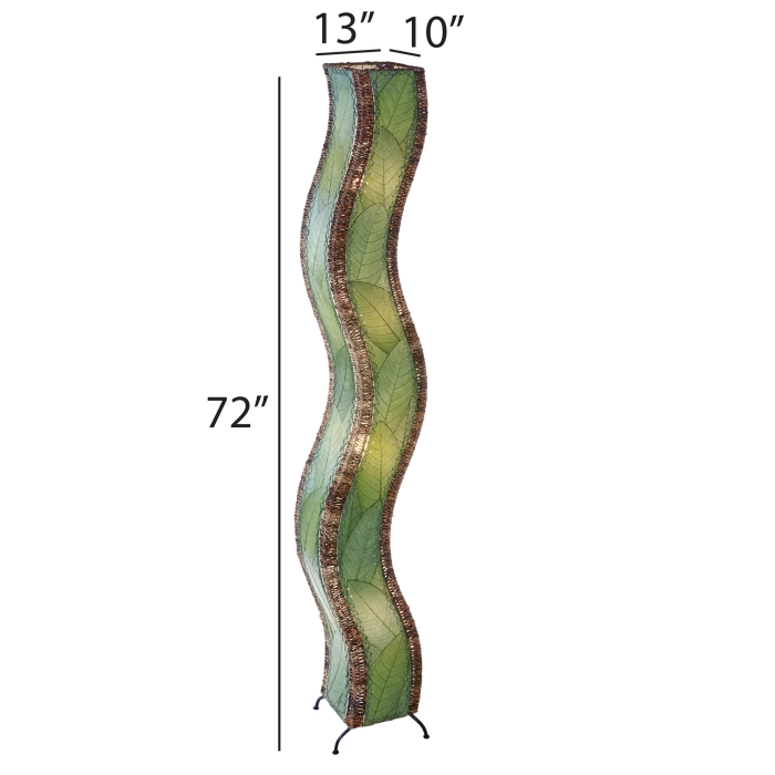 Eangee Home Designs Wave Giant Floor Lamp Green (Item #457 xl g) features a tall, wavy form with brown accents, standing on light wood flooring next to a plant—its sweeping silhouette shapes the space with a calming, fluid presence.