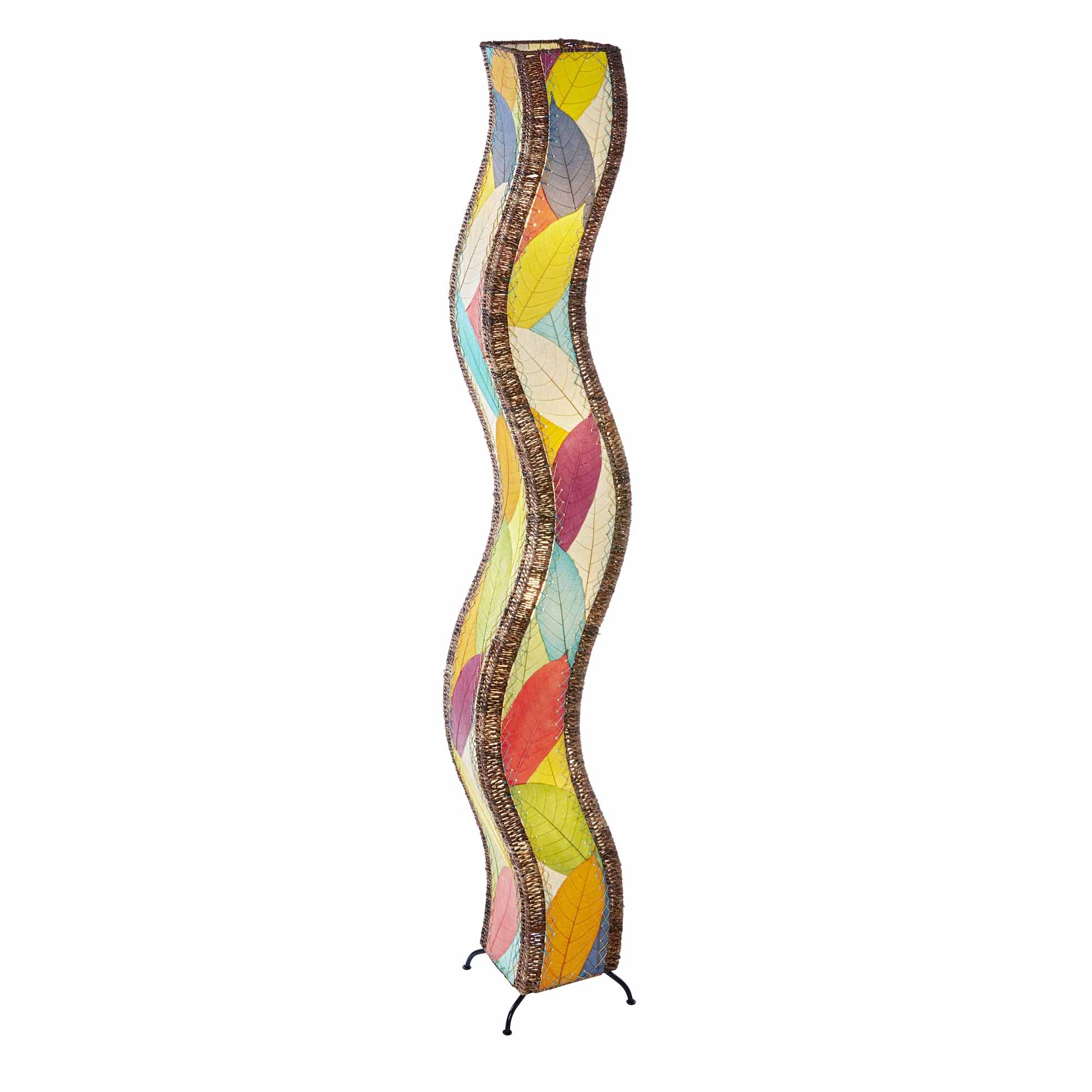 In a sunlit corner of a loft, the Wave Giant Floor crafted by the artisans of Eangee Home Design Lamp in multi color finish by Eangee Home Design stands beside a ceramic vase, its fossilized cocoa leaf panels, abaca twine accents, and hand placed natural leaves casting a warm glow that some designs don't just decorate a space they shape the way it moves.