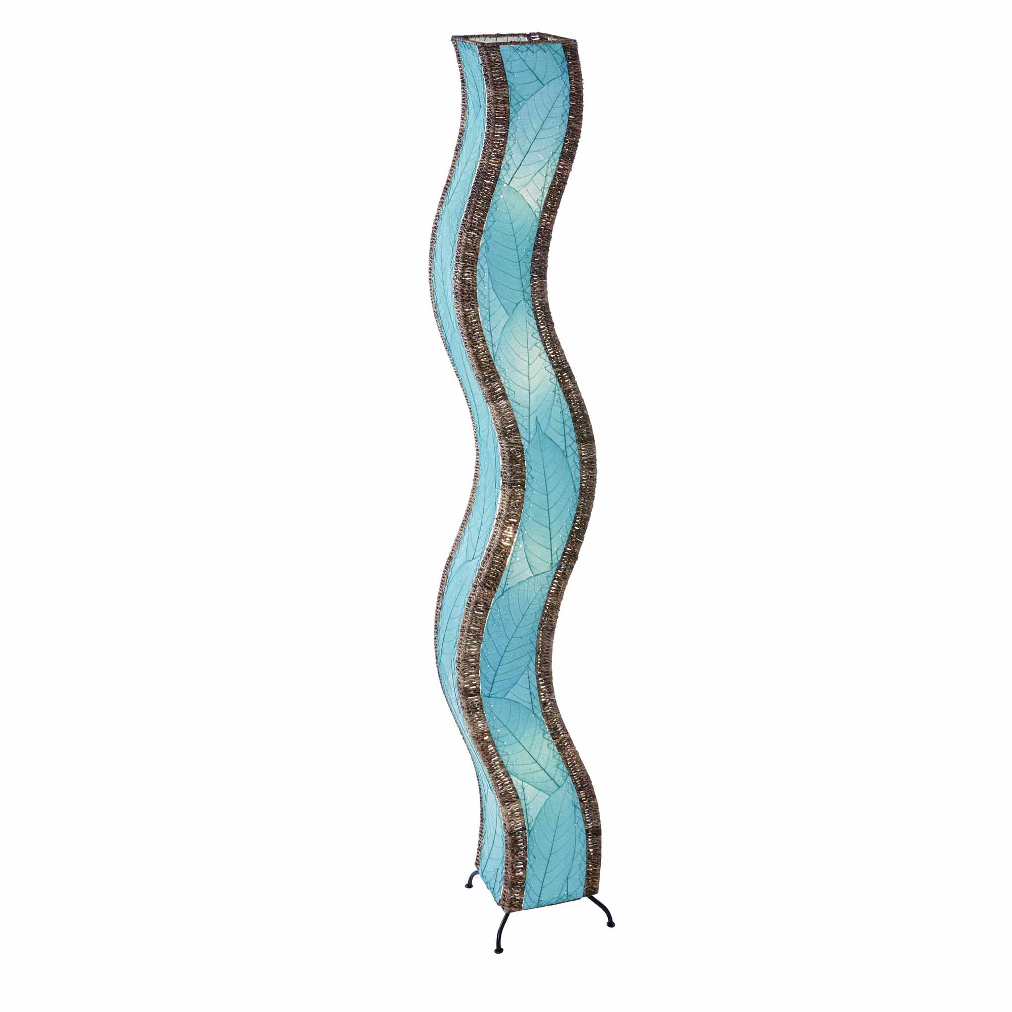 In a entryway beside a console table, the Wave Giant Floor crafted by the artisans of Eangee Home Design Lamp in sea blue finish by Eangee Home Design stands beside a ceramic vase, its fossilized cocoa leaf panels, abaca twine accents, and hand placed natural leaves casting a warm glow that some designs don't just decorate a space they shape the way it moves.