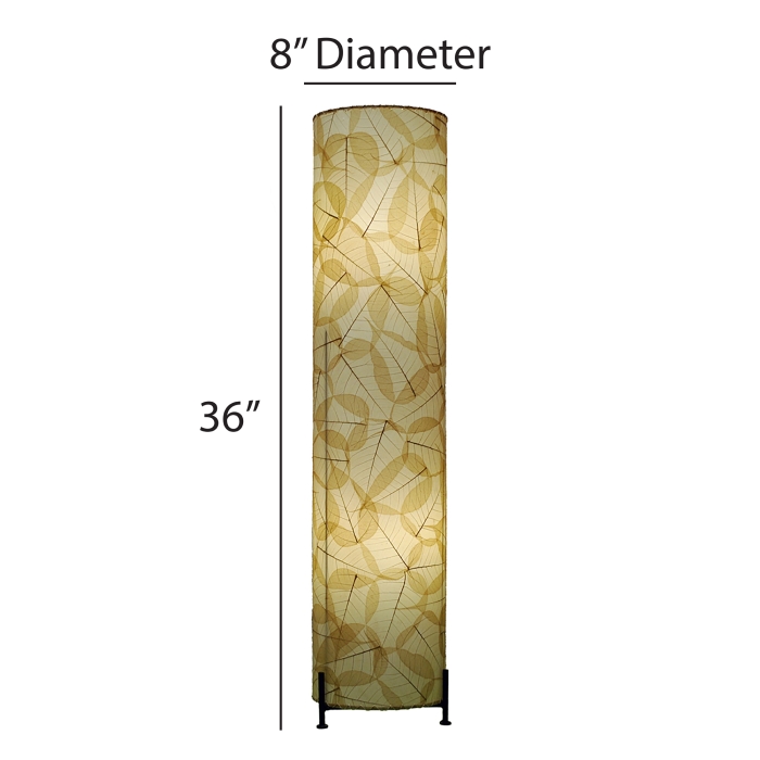 The Banyan Large Floor crafted by the artisans of Eangee Home Design Lamp in natural finish by Eangee Home Design displayed against a white background highlights its fossilized cocoa leaf panels, abaca twine accents, wrought iron frame, hand placed natural leaves, and abaca twine stitching, designed to some pieces fill a space.
