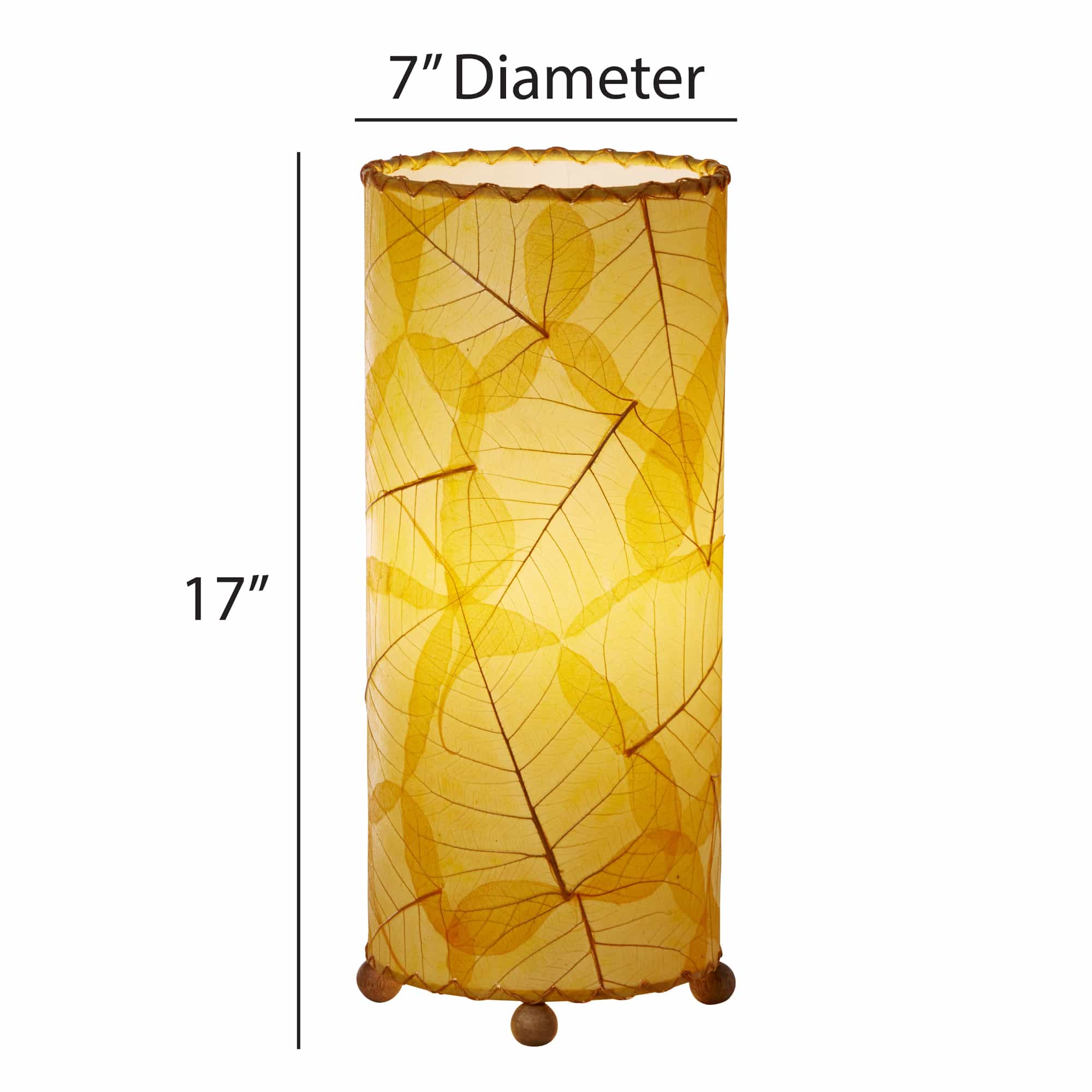 Banyan?inspired table lamp crafted by Eangee Home Design woven with orange fossilized cocoa leaves between wrought?iron ribs; branching silhouette highlights leaf texture while ambient light filters across the textured leaf panels; handcrafted sustainably by fair?trade artisans