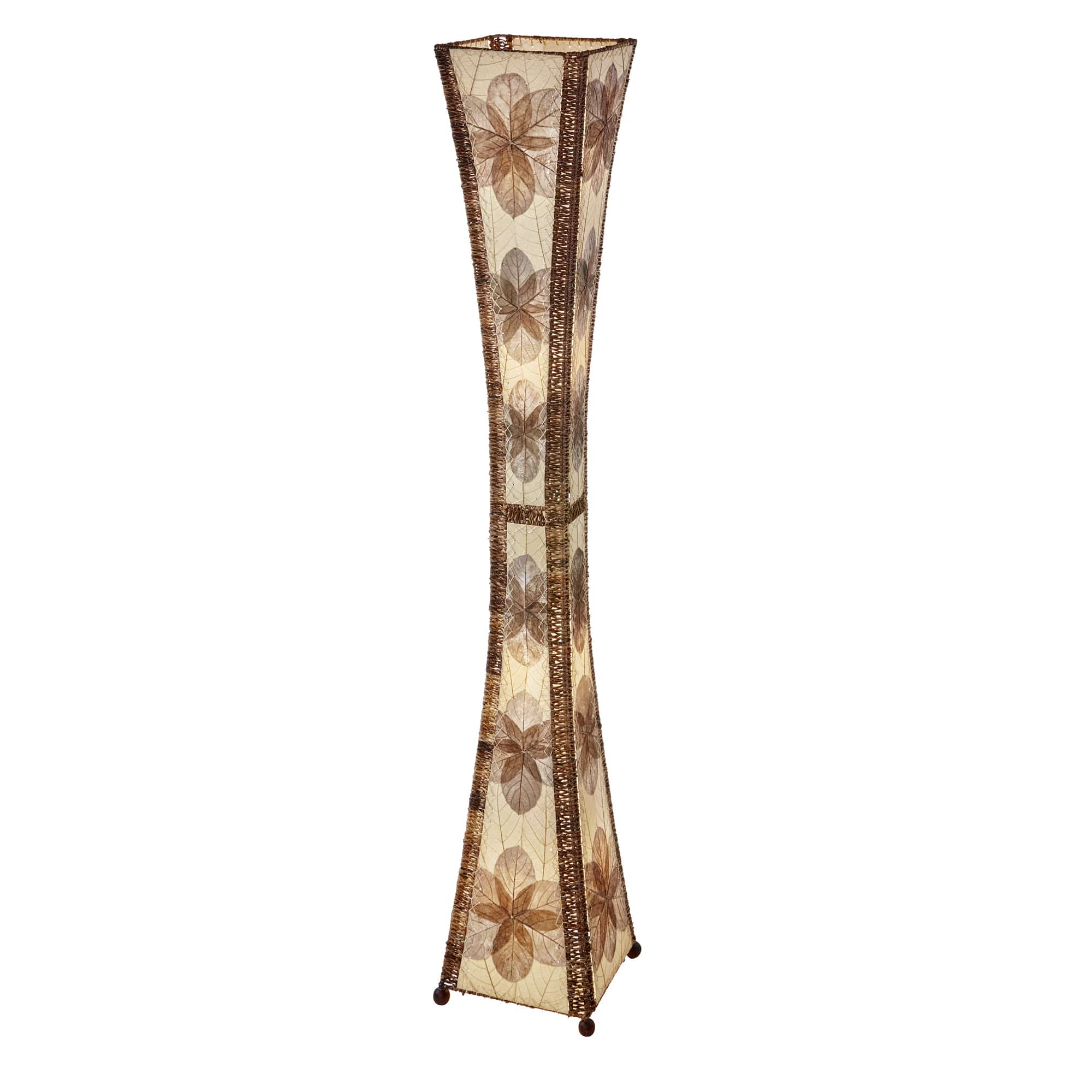 Crafted by the artisans of Eangee Home Design, the Hourglass Giant Floor Lamp in natural against a clean backdrop, featuring jackfruit leaf panels, abaca rope accents, wrought iron frame, eco friendly, handcrafted.