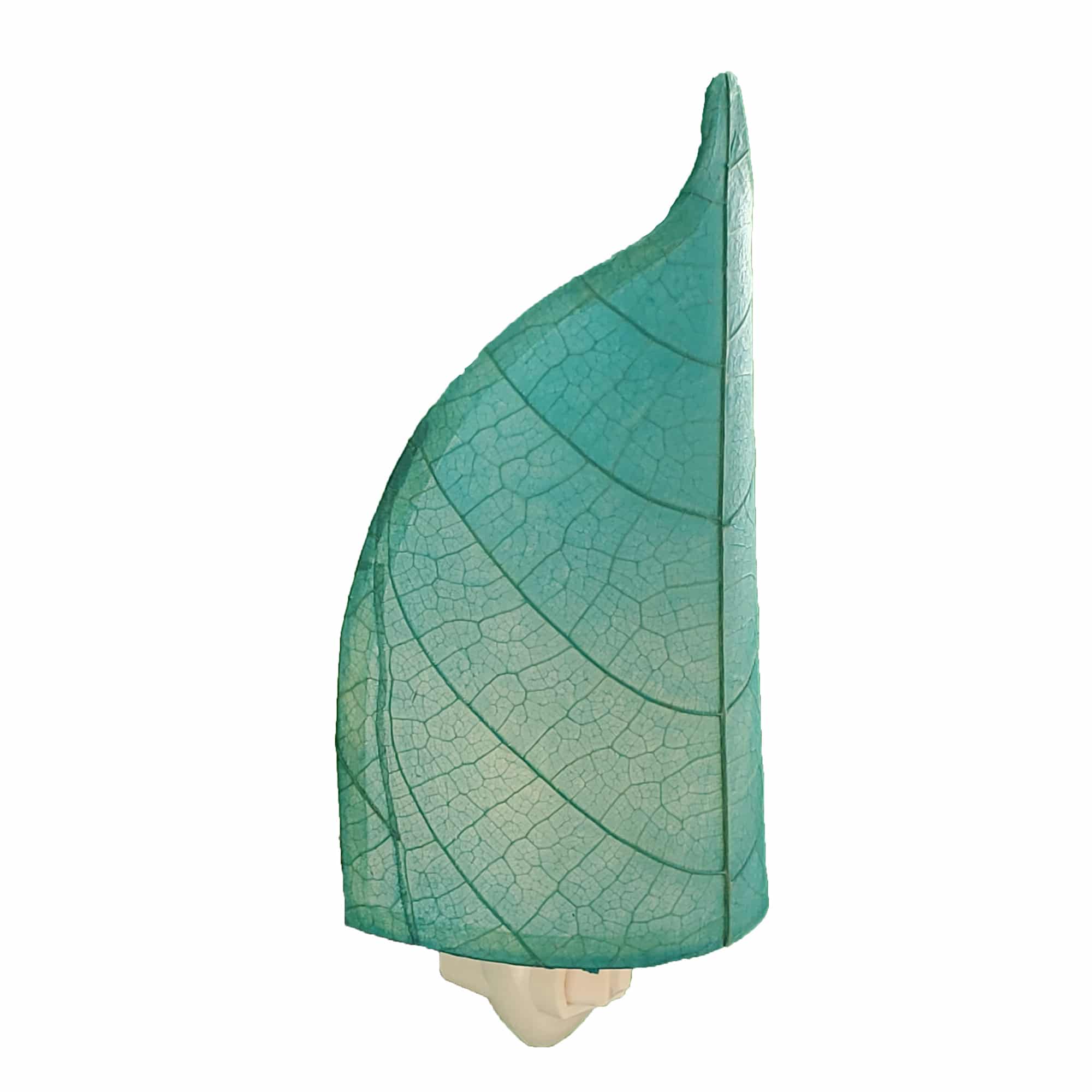 Crafted by the artisans of Eangee Home Design, the Leaf Nightlight in sea blue against a clean backdrop, featuring fossilized cocoa leaf shade, eco friendly, handcrafted.