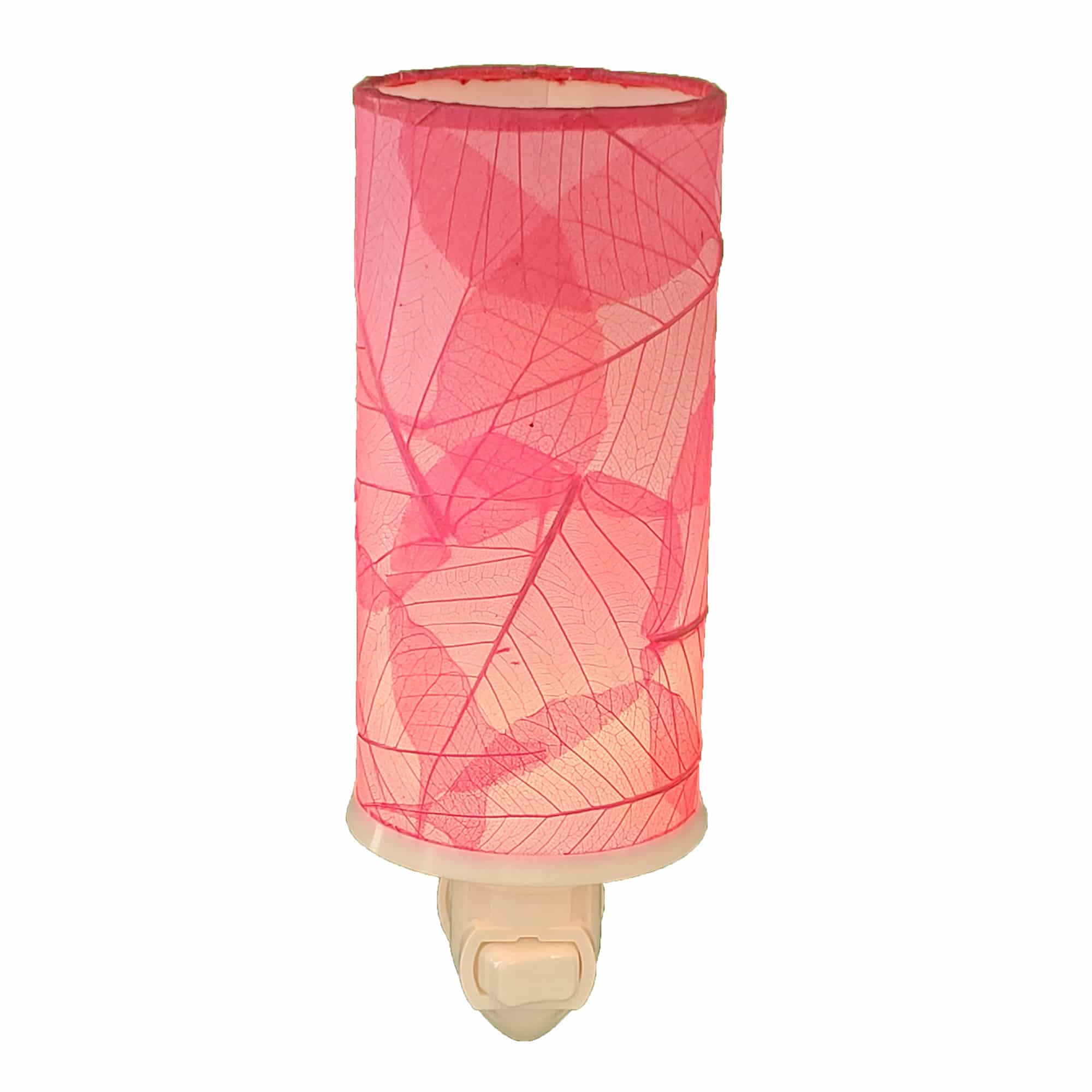 Crafted by the artisans of Eangee Home Design, the Cylinder Nightlight in pink against a clean backdrop, featuring handcrafted detailing, fair trade, eco friendly.