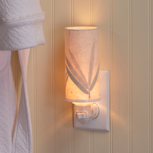 Crafted by the artisans of Eangee Home Design, the Paper Nightlight Bamboo in natural against a clean backdrop, featuring recycled paper shade, sustainably sourced, handcrafted, recycled materials.
