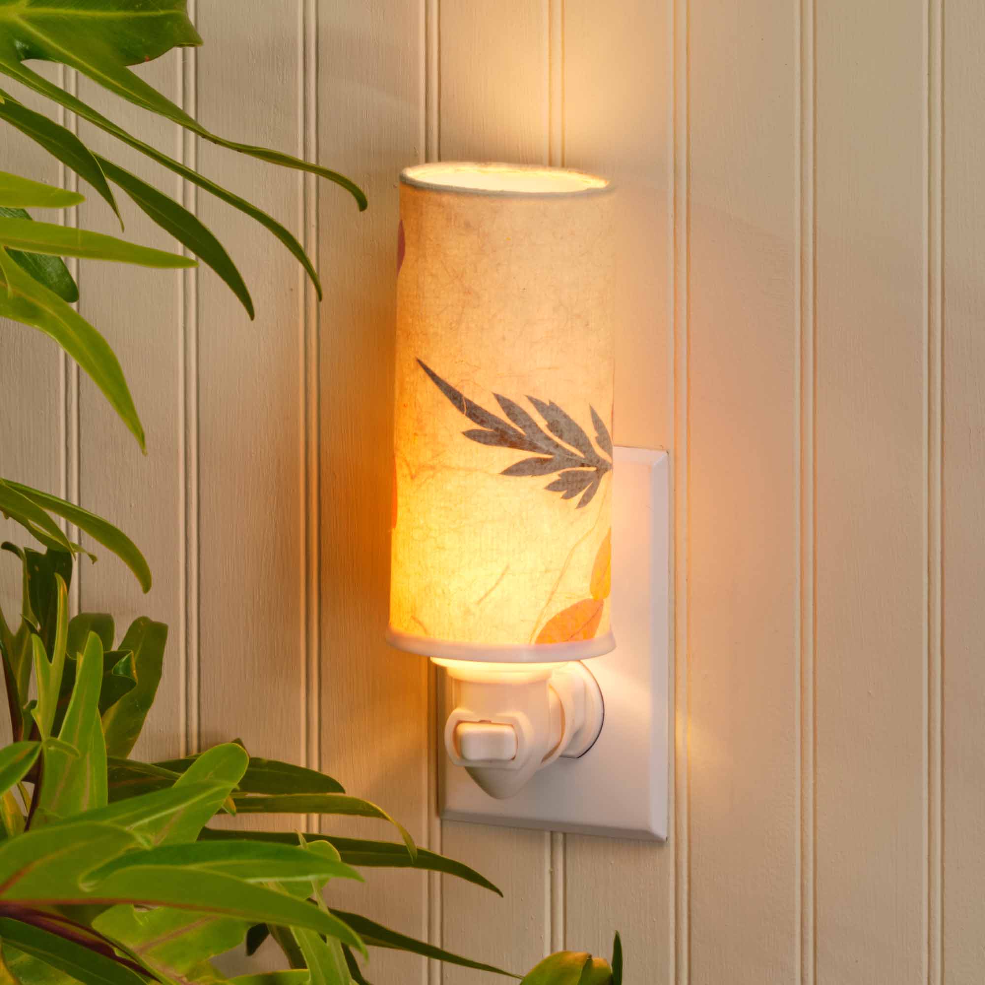 Crafted by the artisans of Eangee Home Design, the Paper Nightlight Acacia in natural against a clean backdrop, featuring recycled paper shade, sustainably sourced, handcrafted, recycled materials.