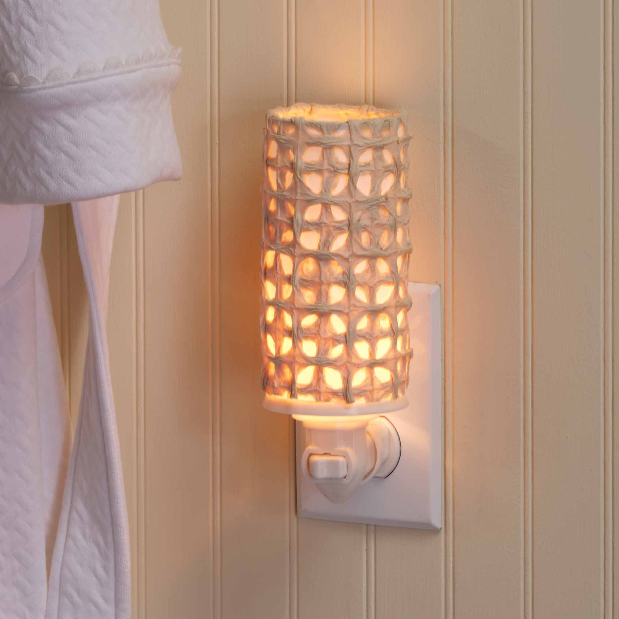 Crafted by the artisans of Eangee Home Design, the Paper Nightlight Mesh in natural against a clean backdrop, featuring recycled paper shade, sustainably sourced, handcrafted, recycled materials.