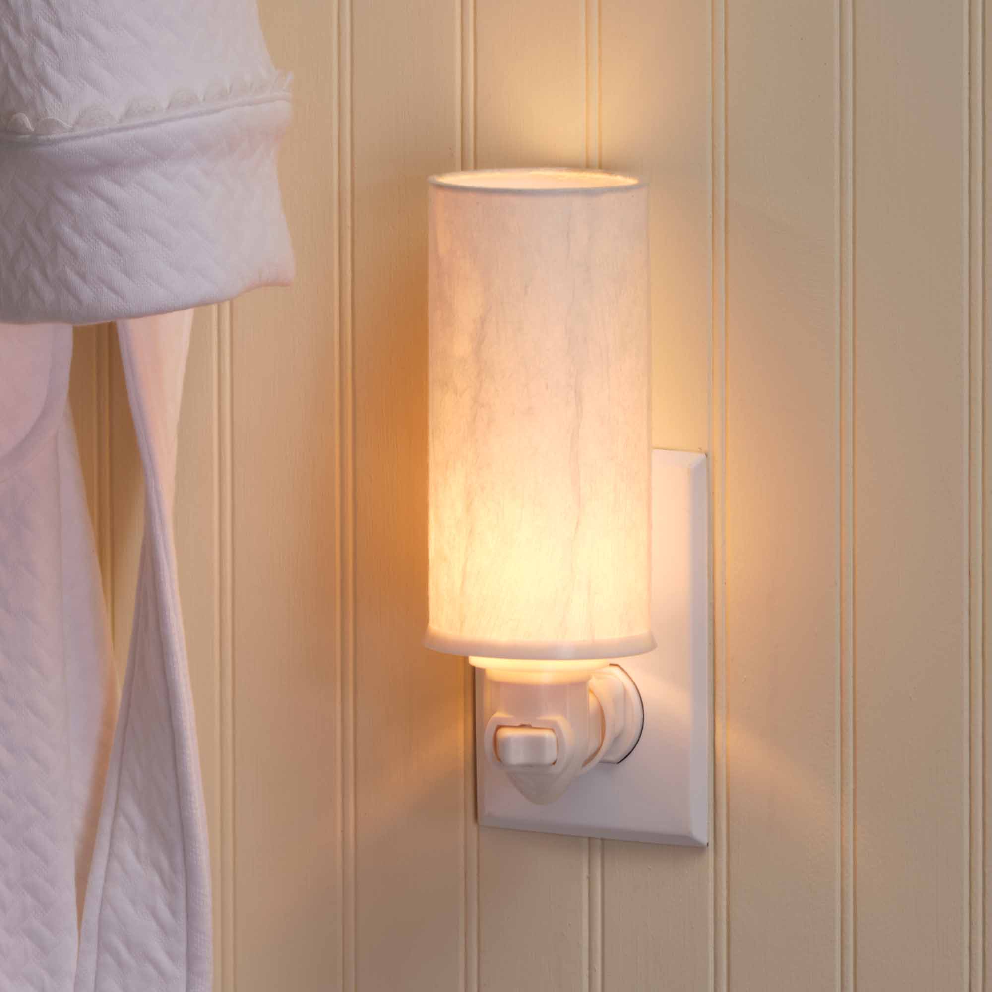 Crafted by the artisans of Eangee Home Design, the Paper Nightlight Glacier in natural against a clean backdrop, featuring recycled paper shade, sustainably sourced, handcrafted, recycled materials.