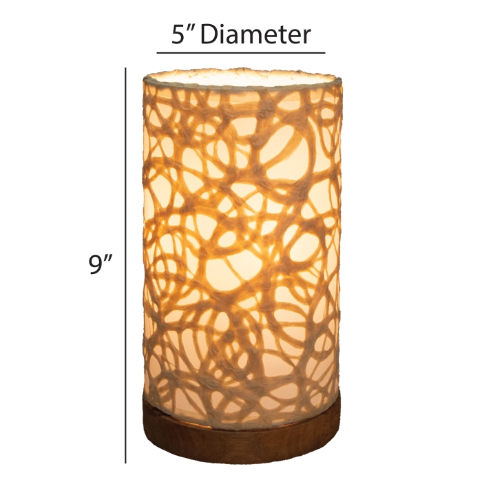 Crafted by the artisans of Eangee Home Design, the Mini Paper Cylinder Table Lamp Swirl in natural against a clean backdrop, featuring reclaimed mango wood base, recycled paper shade, sustainably sourced, recycled materials.