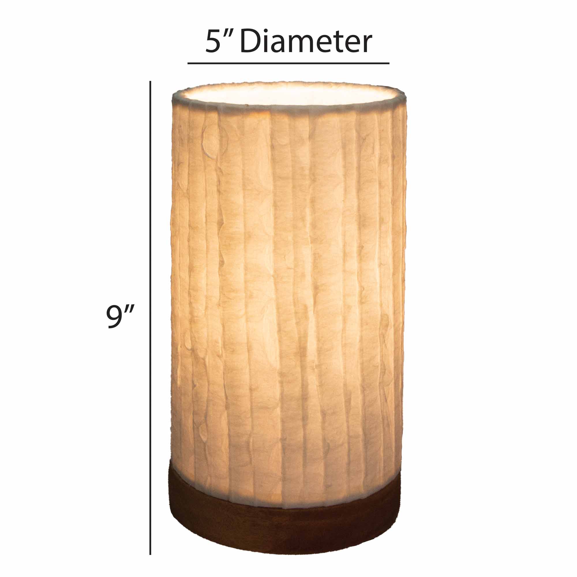Crafted by the artisans of Eangee Home Design, the Mini Paper Cylinder Table Lamp Lines in natural against a clean backdrop, featuring reclaimed mango wood base, recycled paper shade, sustainably sourced, recycled materials.