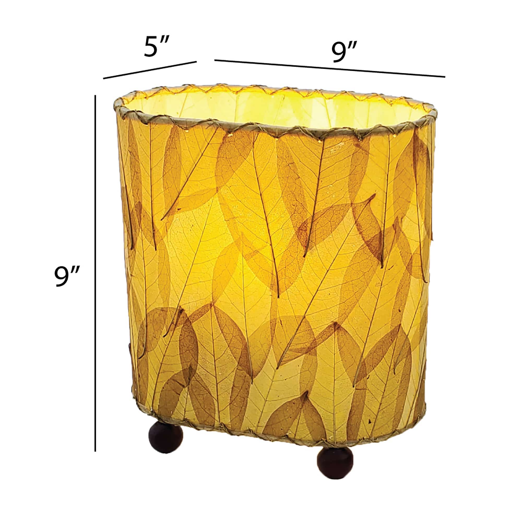 Crafted by the artisans of Eangee Home Design, the Mini Guyabano Table Lamp in natural against a clean backdrop, featuring fossilized cocoa leaf shade, guyabano leaf shade, wrought iron frame.