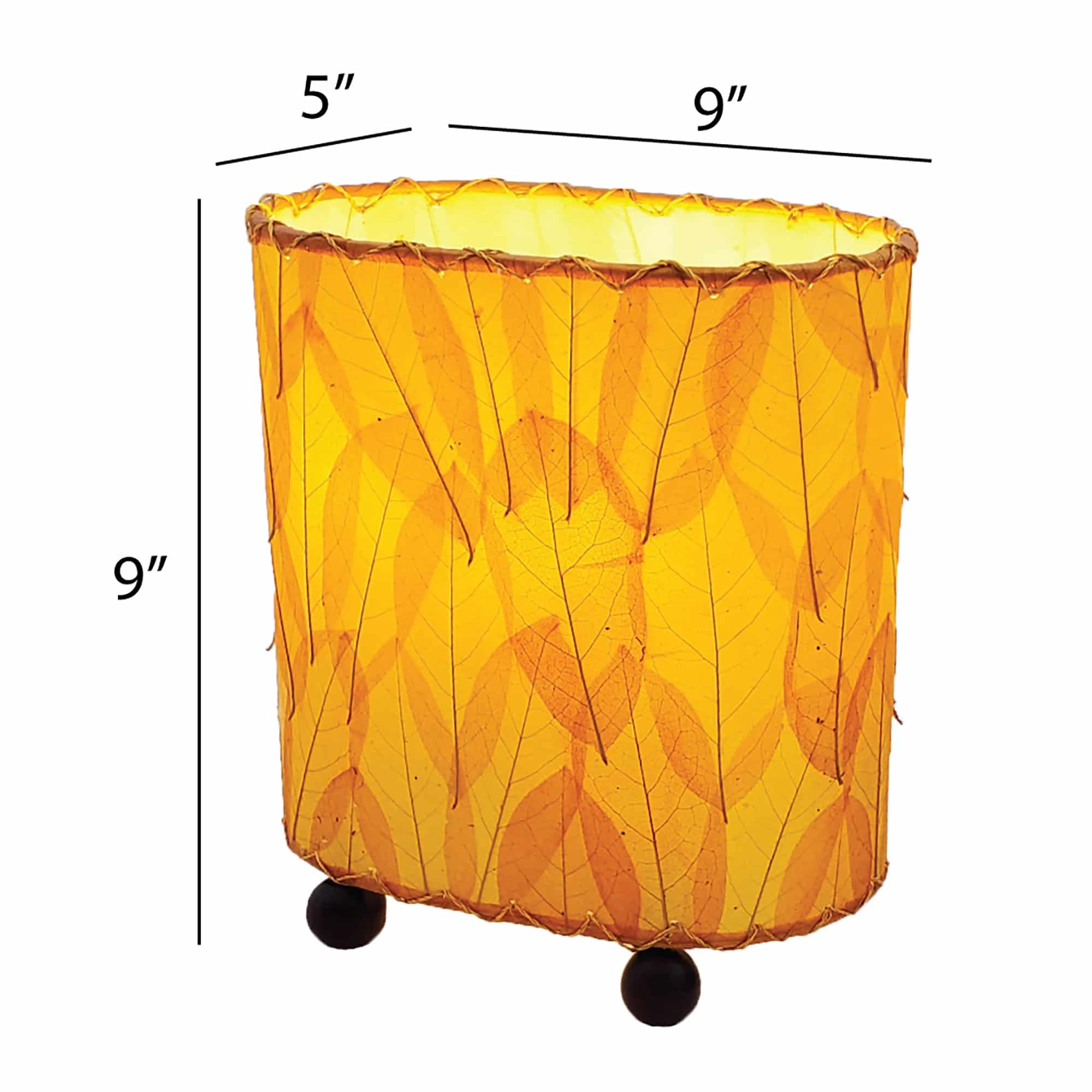 Crafted by the artisans of Eangee Home Design, the Mini Guyabano Table Lamp in orange against a clean backdrop, featuring fossilized cocoa leaf shade, guyabano leaf shade, wrought iron frame.