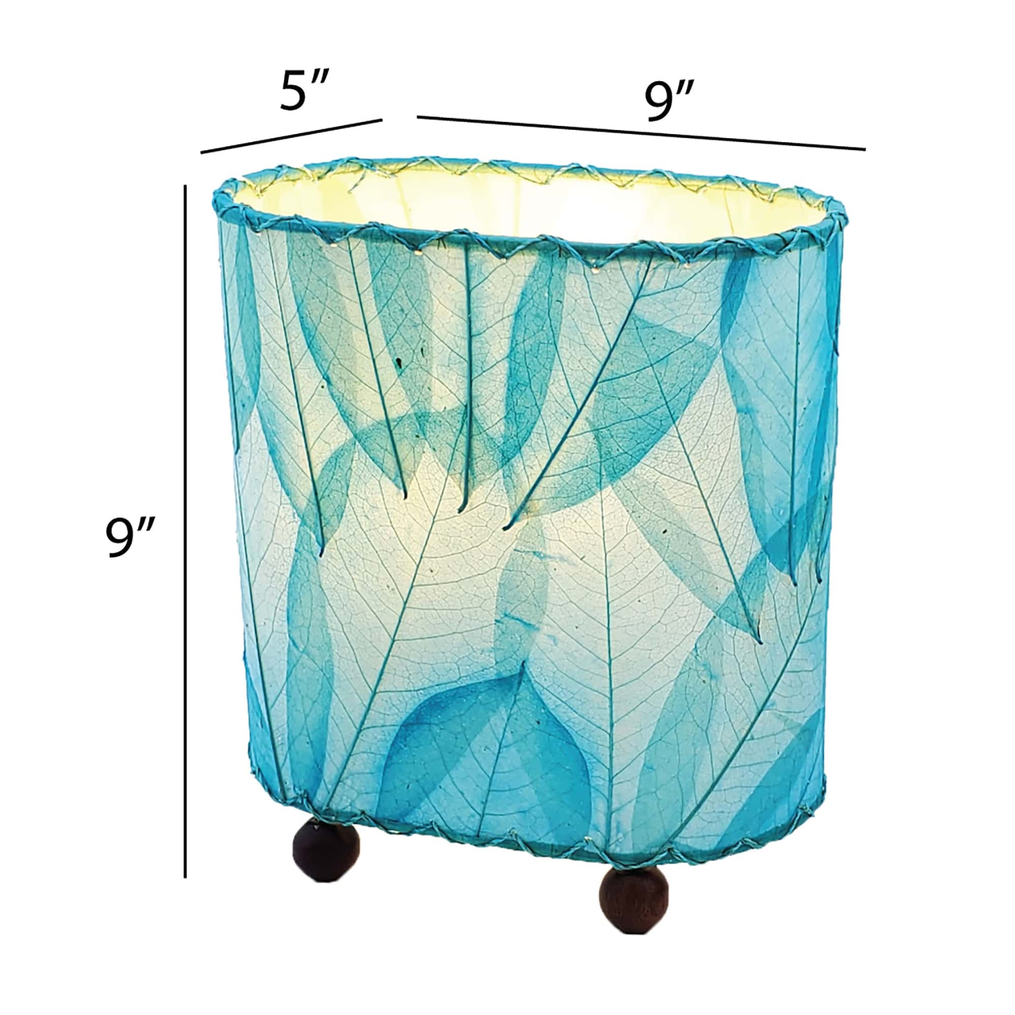 Crafted by the artisans of Eangee Home Design, the Mini Guyabano Table Lamp in sea blue against a clean backdrop, featuring fossilized cocoa leaf shade, guyabano leaf shade, wrought iron frame.