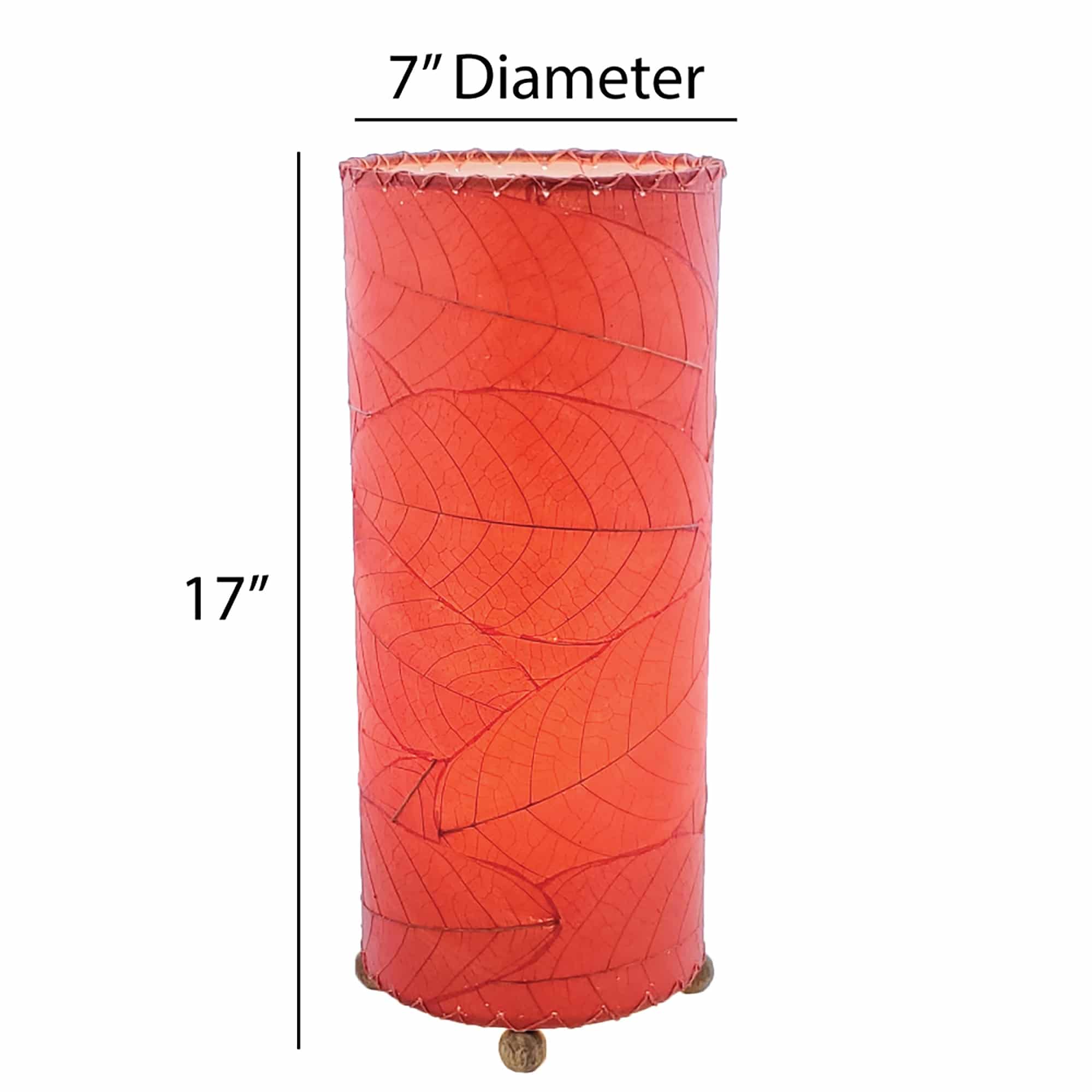 Crafted by the artisans of Eangee Home Design, the Cocoa Leaf Cylinder Table Lamp in red against a clean backdrop, featuring fossilized cocoa leaf shade, wrought iron frame, handcrafted.