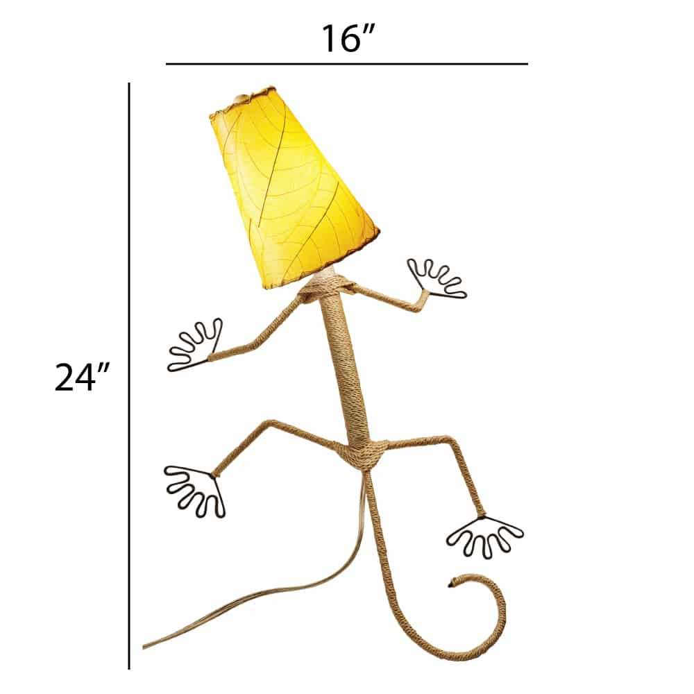 Crafted by the artisans of Eangee Home Design, the Gecko Wall Lamp Shade in yellow against a clean backdrop, featuring fossilized cocoa leaf shade, abaca rope accents, wrought iron frame, handcrafted.