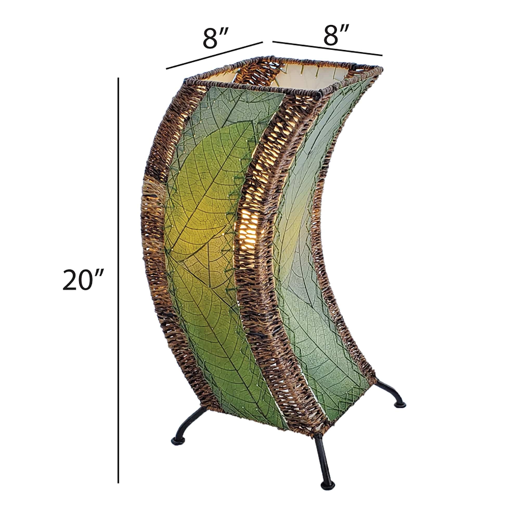 Crafted by the artisans of Eangee Home Design, the C Shape Table Lamp in green against a clean backdrop, featuring fossilized cocoa leaf shade, abaca rope accents, fair trade, handcrafted.