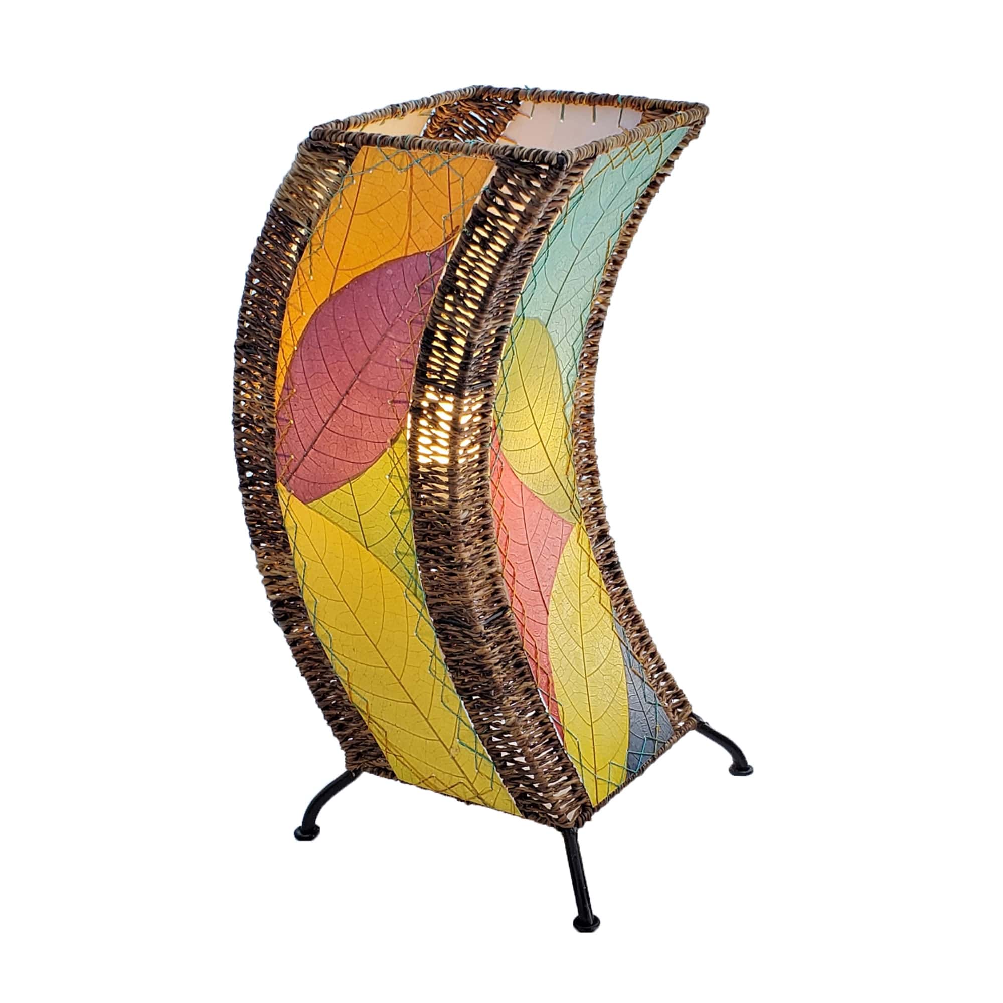 Crafted by the artisans of Eangee Home Design, the C Shape Table Lamp in multi color against a clean backdrop, featuring fossilized cocoa leaf shade, abaca rope accents, fair trade, handcrafted.