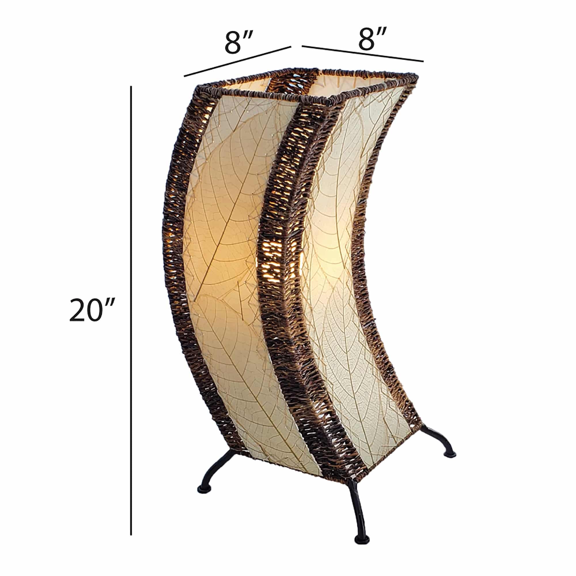 Crafted by the artisans of Eangee Home Design, the C Shape Table Lamp in natural against a clean backdrop, featuring fossilized cocoa leaf shade, abaca rope accents, fair trade, handcrafted.