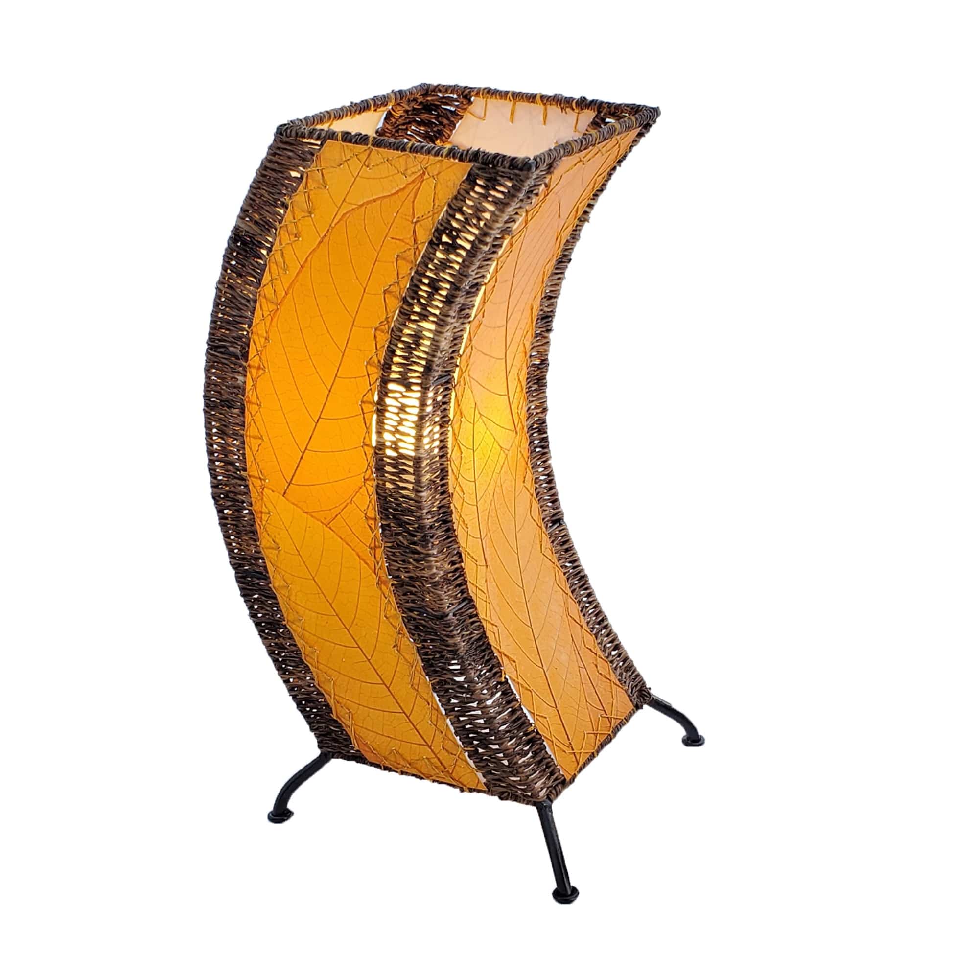 Crafted by the artisans of Eangee Home Design, the C Shape Table Lamp in orange against a clean backdrop, featuring fossilized cocoa leaf shade, abaca rope accents, fair trade, handcrafted.