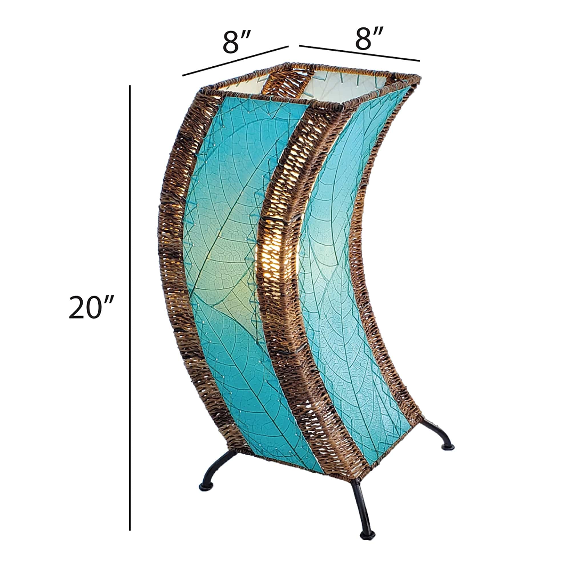 Crafted by the artisans of Eangee Home Design, the C Shape Table Lamp in sea blue against a clean backdrop, featuring fossilized cocoa leaf shade, abaca rope accents, fair trade, handcrafted.