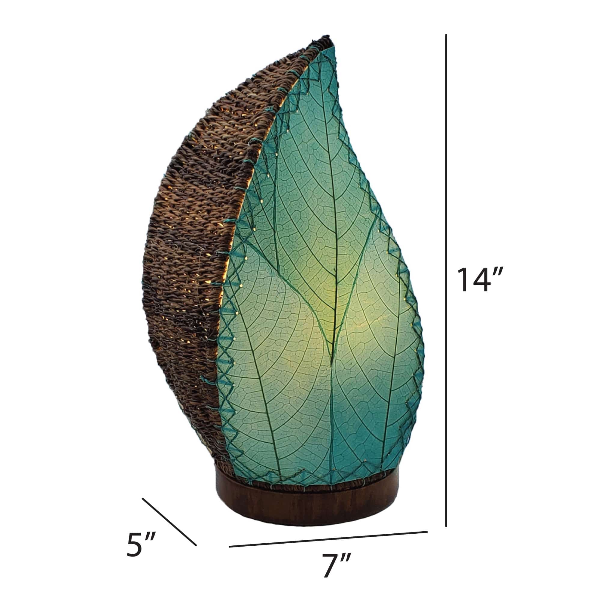 Crafted by the artisans of Eangee Home Design, the Leaflet Table Lamp in sea blue against a clean backdrop, featuring fossilized cocoa leaf shade, abaca rope accents, reclaimed mango wood base, wrought iron frame, sustainably sourced.