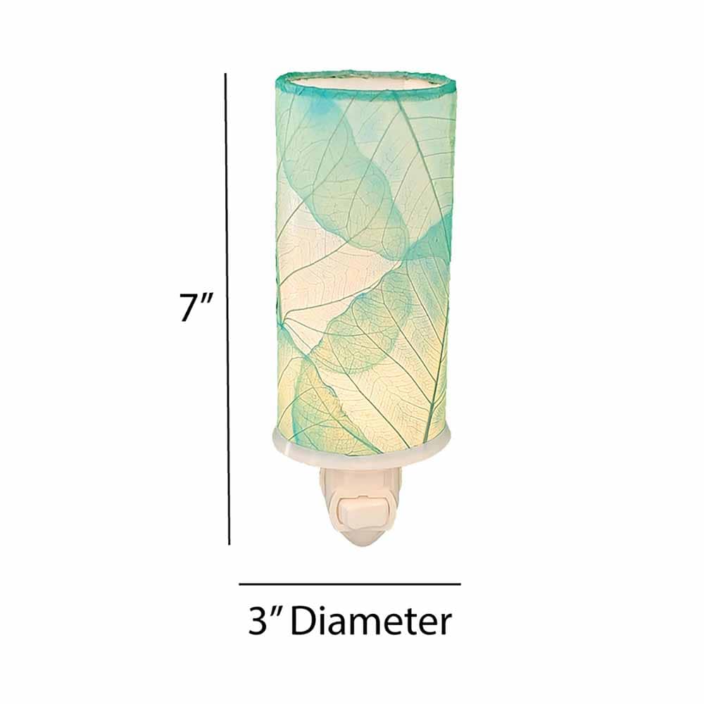 Crafted by the artisans of Eangee Home Design, the Cylinder Nightlight in sea blue against a clean backdrop, featuring handcrafted detailing, fair trade, eco friendly.