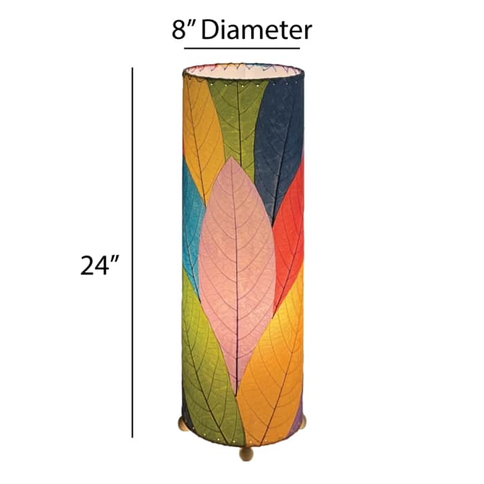 Crafted by the artisans of Eangee Home Design, the 24 Inch Cocoa Leaf Cylinder Table Lamp in multi color against a clean backdrop, featuring fossilized cocoa leaf shade, fair trade, eco friendly, sustainably sourced, handcrafted.