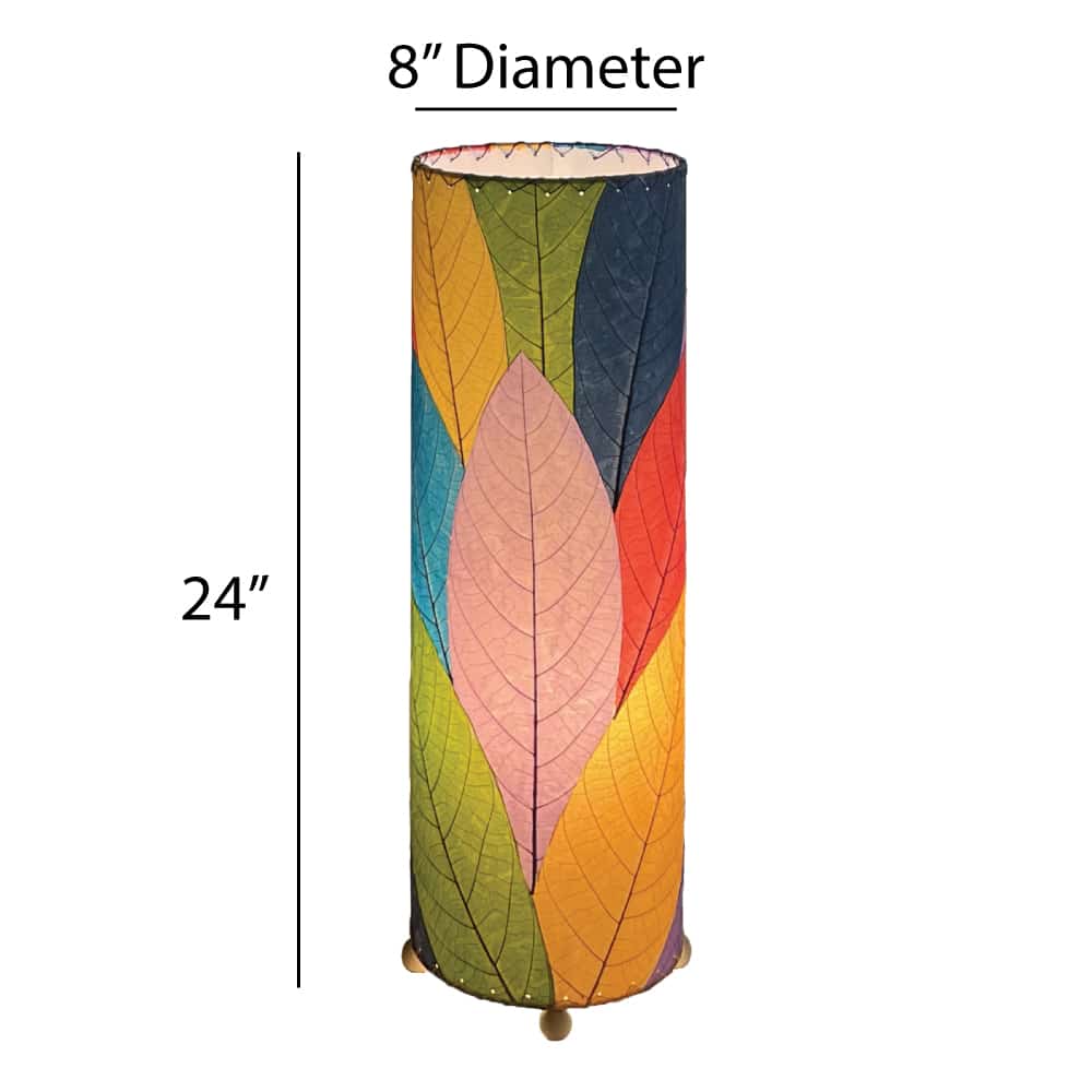 Crafted by the artisans of Eangee Home Design, the 24 Inch Cocoa Leaf Cylinder Table Lamp in multi color against a clean backdrop, featuring fossilized cocoa leaf shade, fair trade, eco friendly, sustainably sourced, handcrafted.