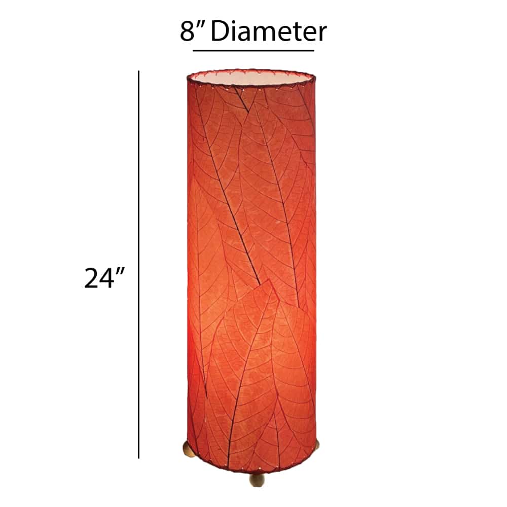 Crafted by the artisans of Eangee Home Design, the 24 Inch Cocoa Leaf Cylinder Table Lamp in red against a clean backdrop, featuring fossilized cocoa leaf shade, fair trade, eco friendly, sustainably sourced, handcrafted.