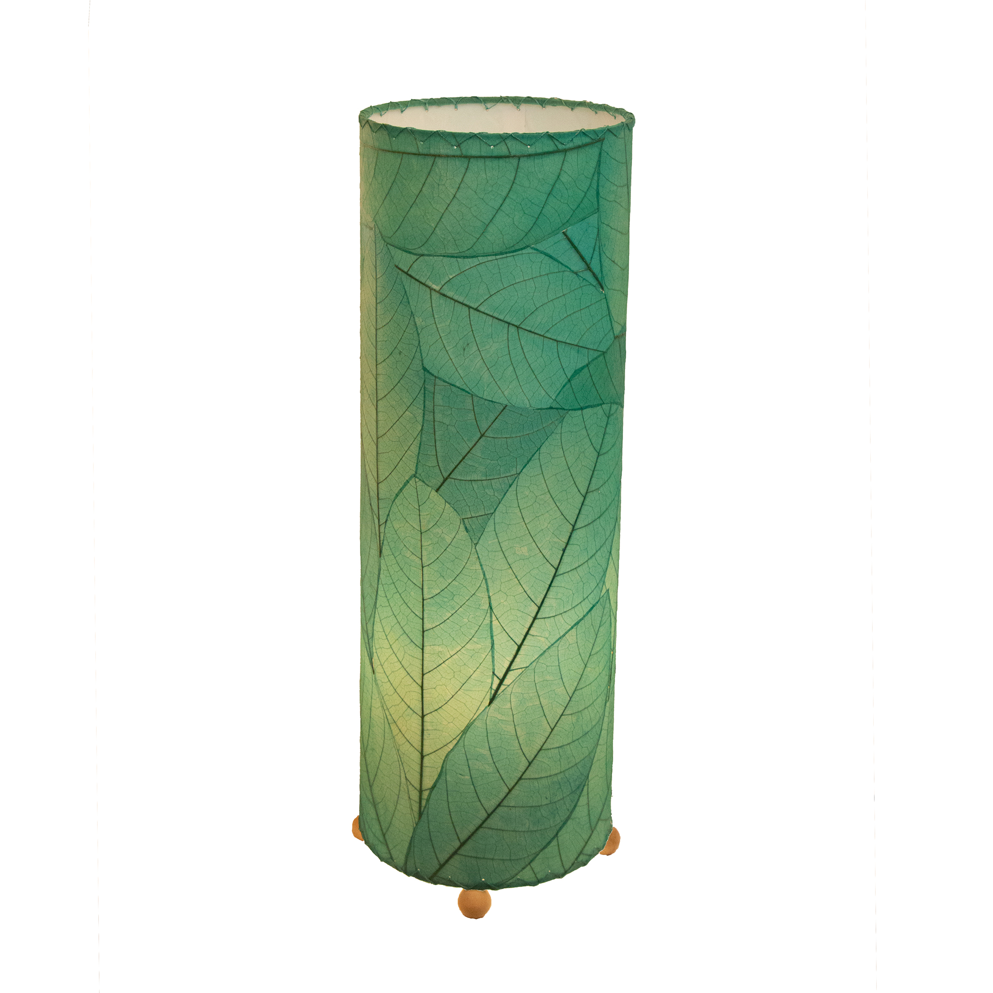 Crafted by the artisans of Eangee Home Design, the 24 Inch Cocoa Leaf Cylinder Table Lamp in sea blue against a clean backdrop, featuring fossilized cocoa leaf shade, fair trade, eco friendly, sustainably sourced, handcrafted.