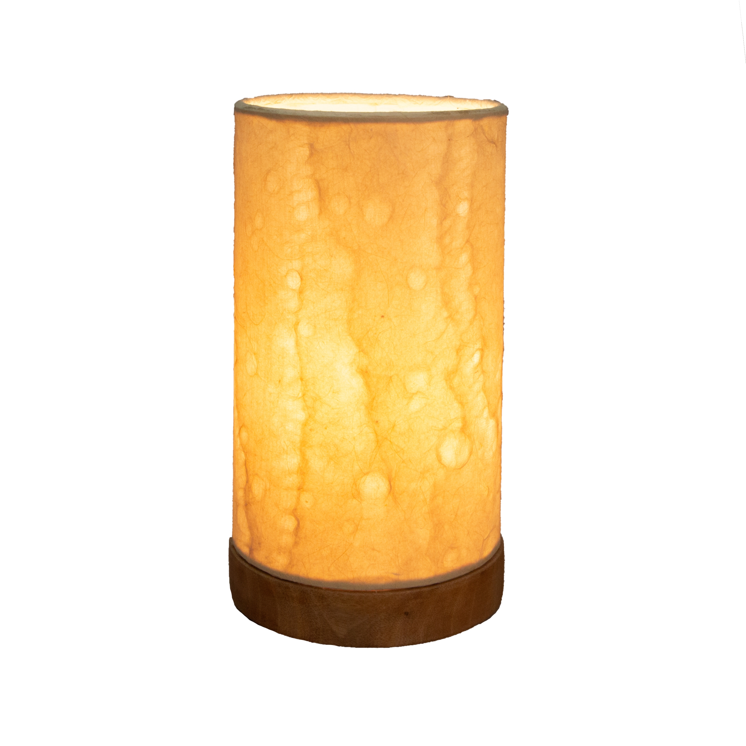 Crafted by the artisans of Eangee Home Design, the Mini Paper Cylinder Table Lamp Wave in natural against a clean backdrop, featuring reclaimed mango wood base, recycled paper shade, sustainably sourced, recycled materials.
