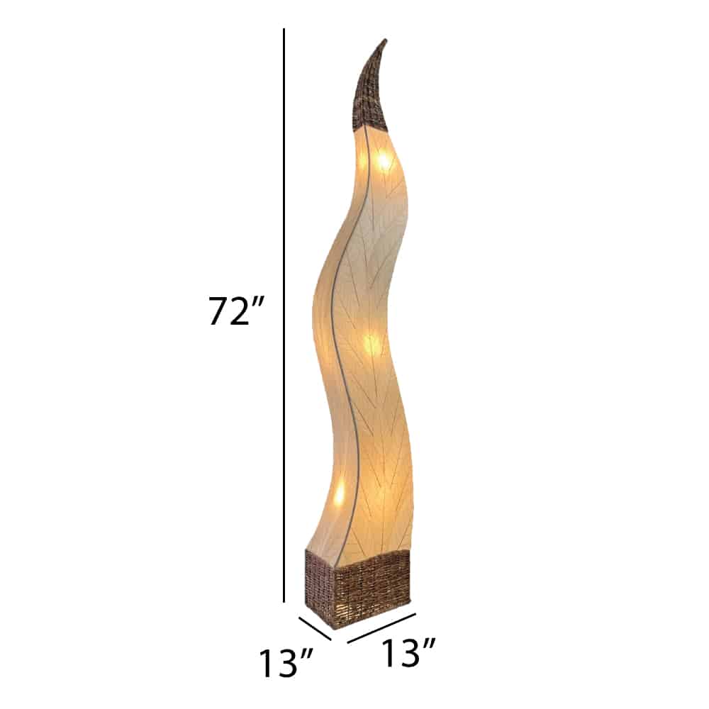 Crafted by the artisans of Eangee Home Design, the Flame Giant Lamp in natural against a clean backdrop, featuring fossilized cocoa leaf shade, abaca rope accents, fair trade.