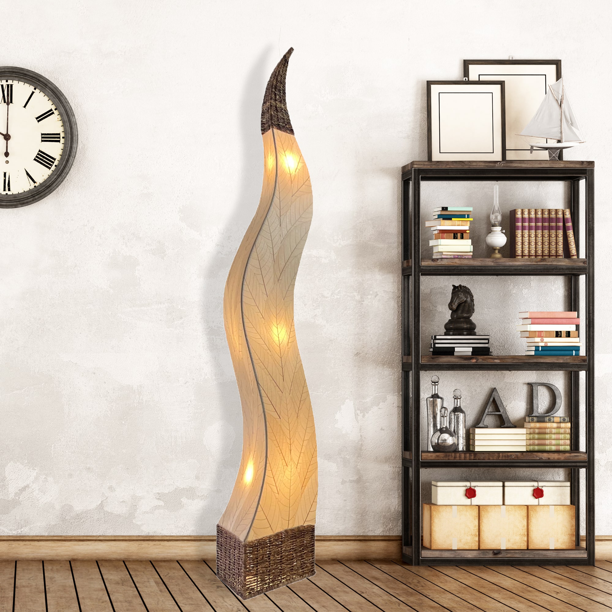In a coastal inspired living room, crafted by the artisans of Eangee Home Design, the Flame Giant Lamp in natural stands gracefully, featuring fossilized cocoa leaf shade, abaca rope accents, fair trade, adding warmth and character to the space.