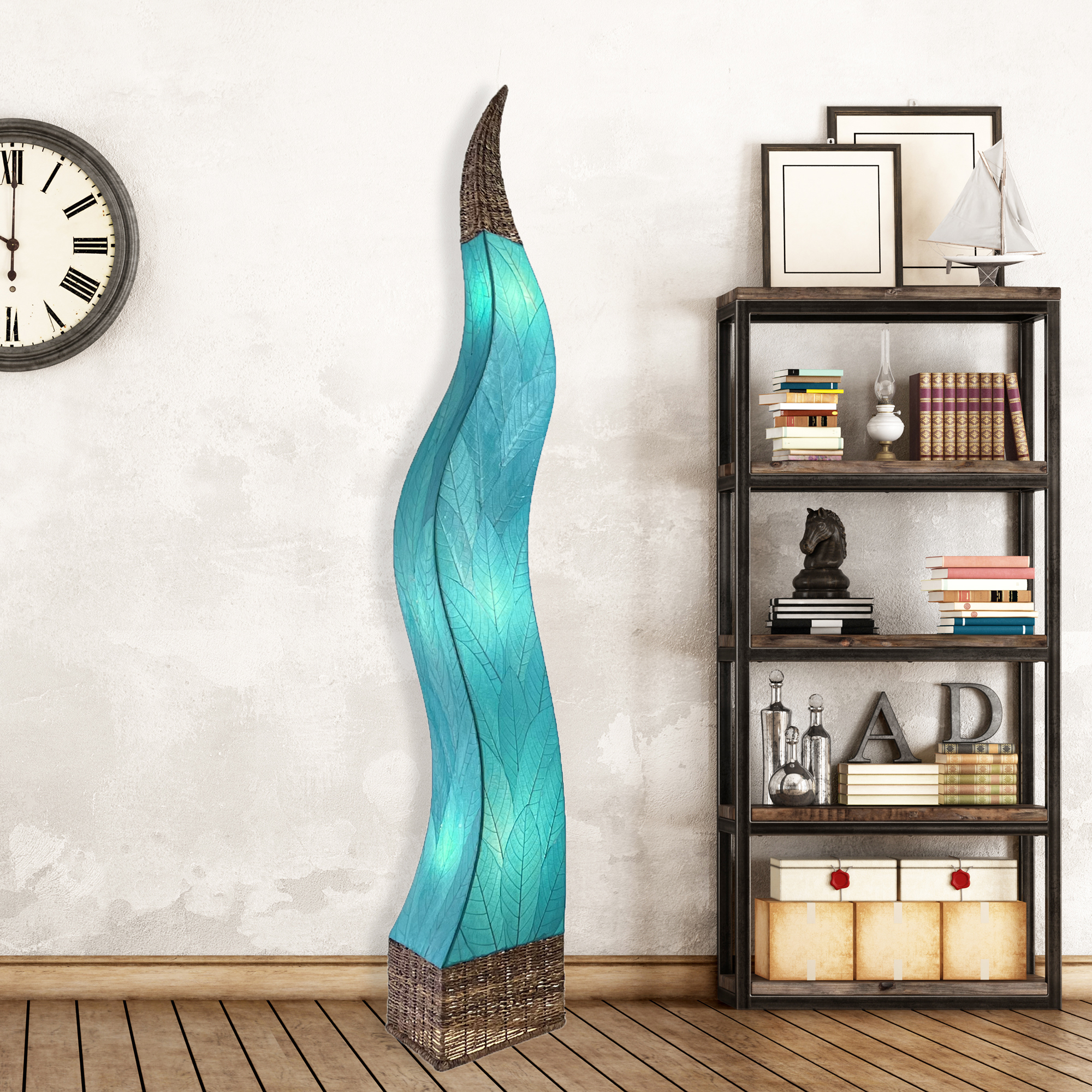 In a minimalist loft with natural textures, crafted by the artisans of Eangee Home Design, the Flame Giant Lamp in sea blue stands gracefully, featuring fossilized cocoa leaf shade, abaca rope accents, fair trade, adding warmth and character to the space.