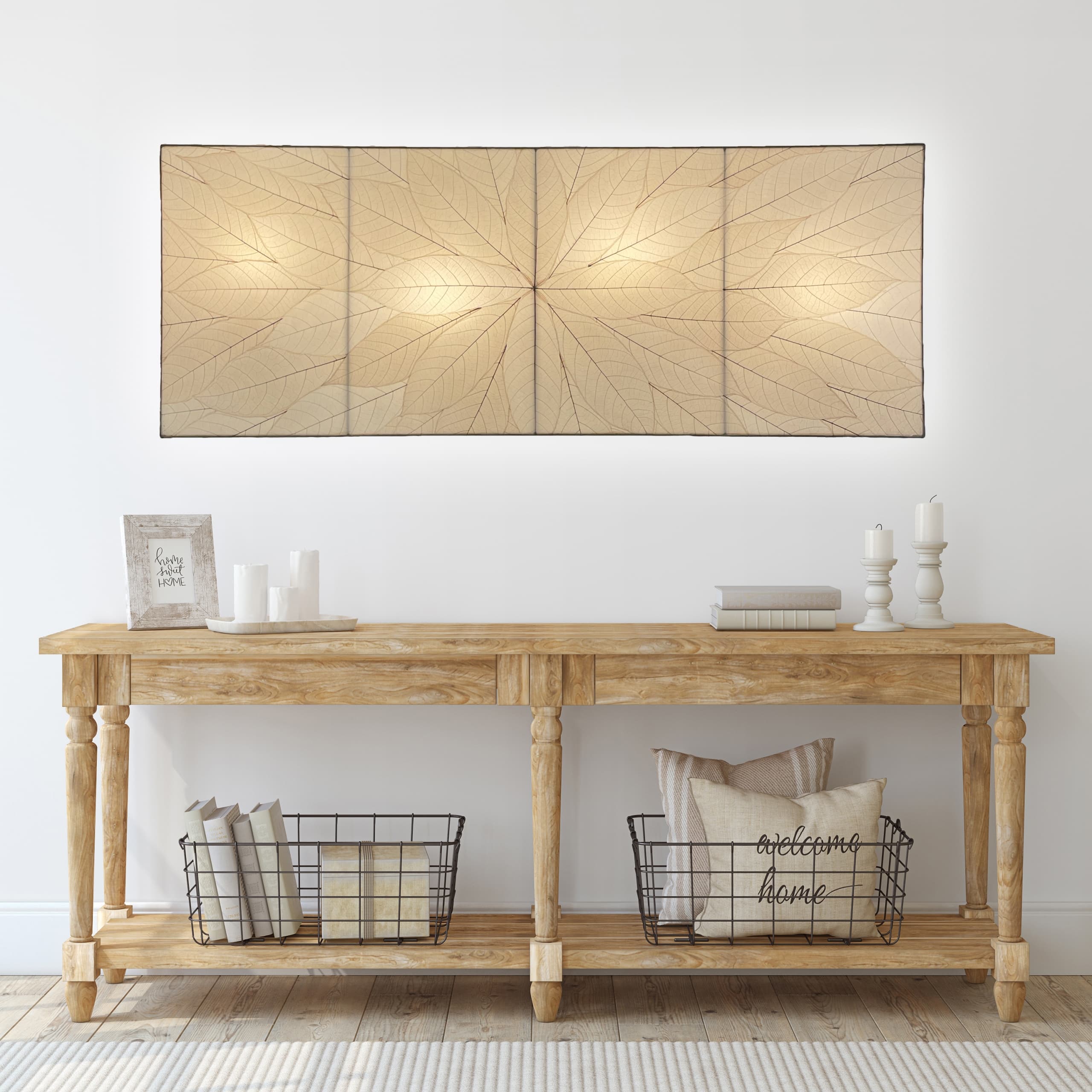 Crafted by the artisans of Eangee Home Design, the Sunburst Panel Wall Lamp in natural against a clean backdrop, featuring fossilized cocoa leaf shade, fair trade.