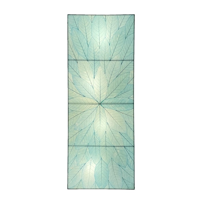 Crafted by the artisans of Eangee Home Design, the Sunburst Panel Wall Lamp in sea blue against a clean backdrop, featuring fossilized cocoa leaf shade, fair trade.