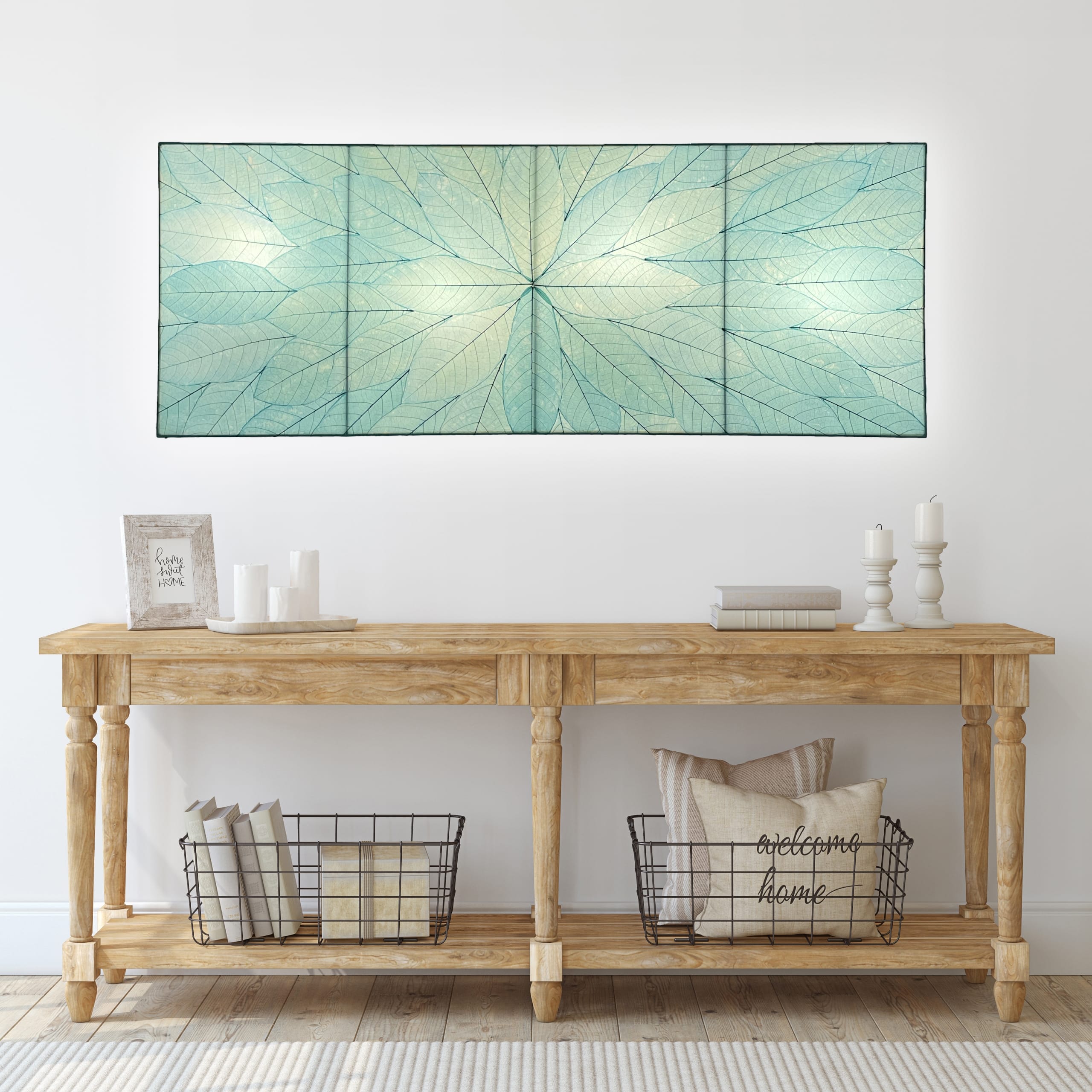 Crafted by the artisans of Eangee Home Design, the Sunburst Panel Wall Lamp in sea blue against a clean backdrop, featuring fossilized cocoa leaf shade, fair trade.