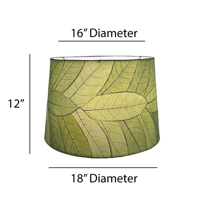 Crafted by the artisans of Eangee Home Design, the 18 Inch Tapered Drum Shade in green against a clean backdrop, featuring fossilized cocoa leaf shade, wrought iron frame, eco friendly, sustainably sourced.